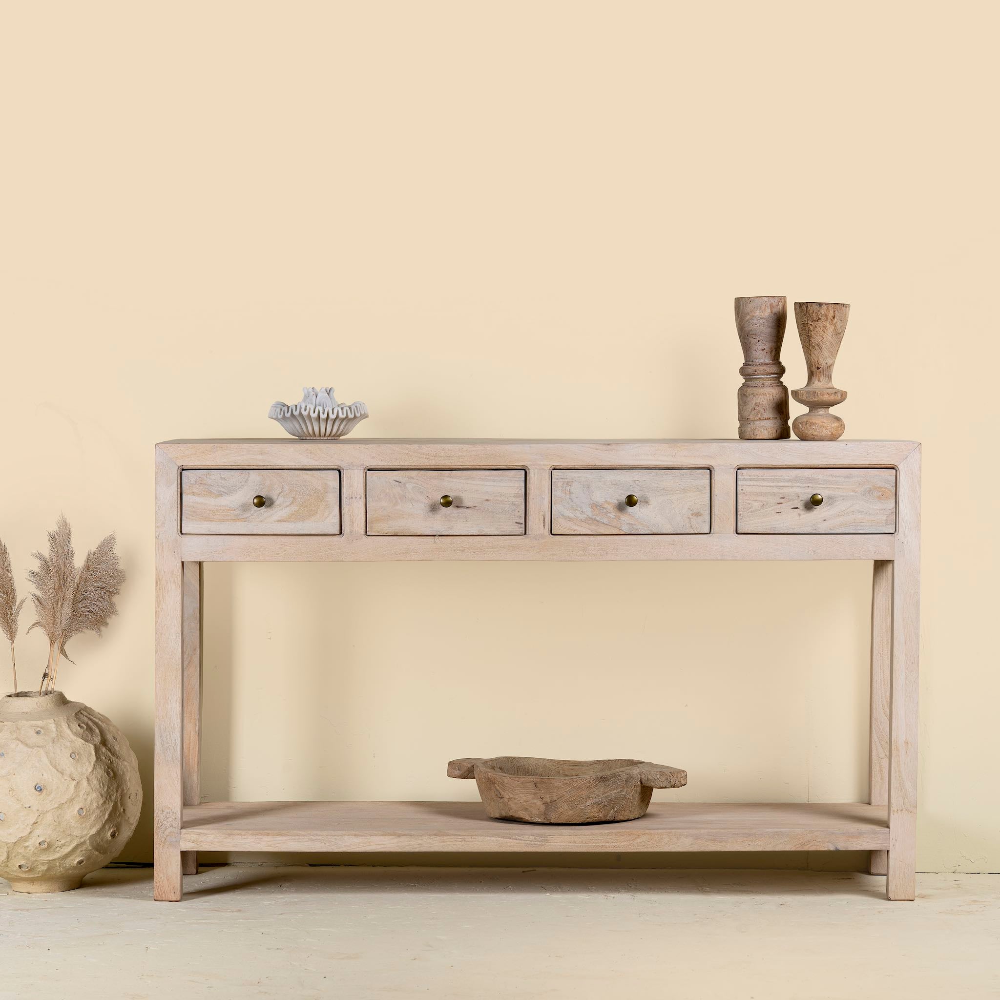 Sustainable reclaimed wood console table with four drawers, lower shelf, and sandblasted mango wood finish, 150 × 40 × 90 cm.