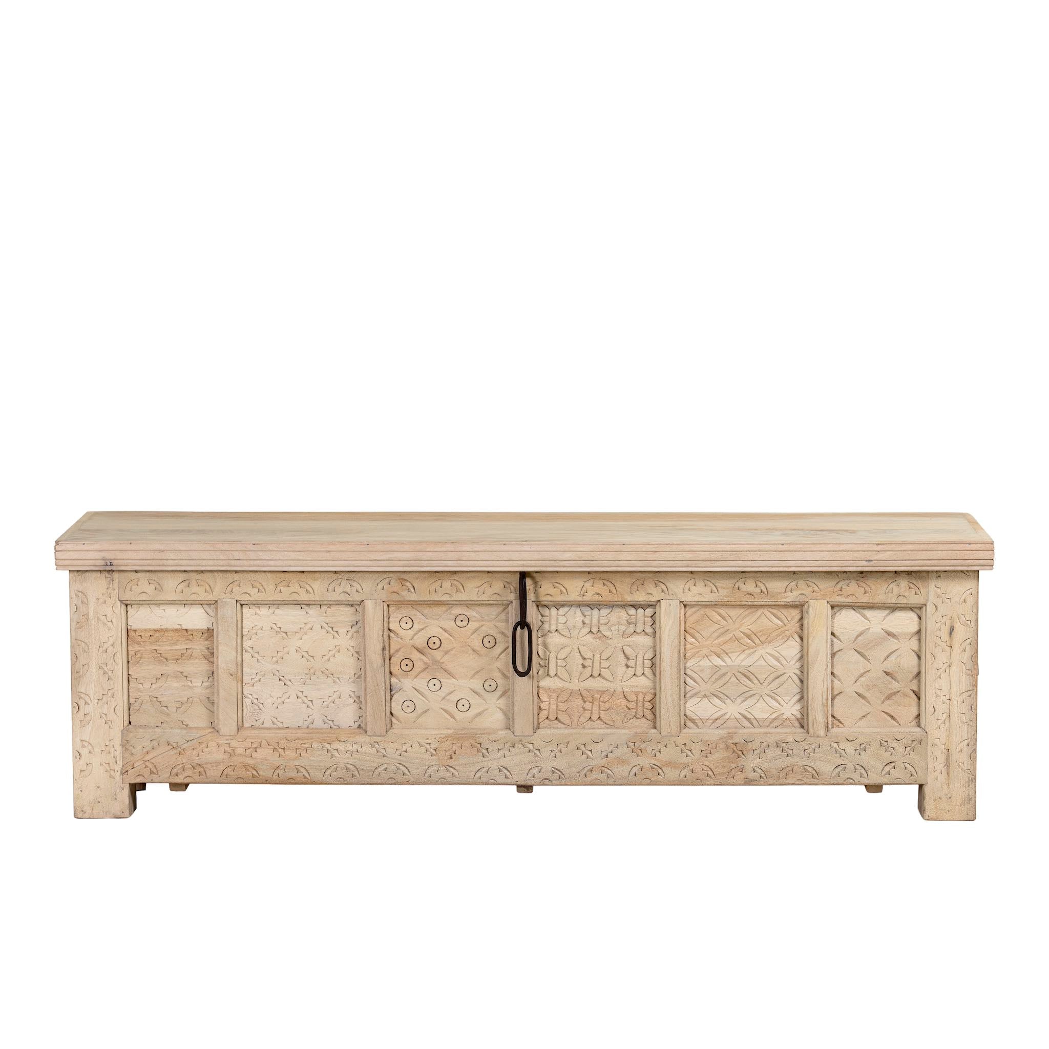 White background image of a Ibiza style carved mango wood chest with sandblasted finish and iron lock; 150 × 40 × 45 cm.