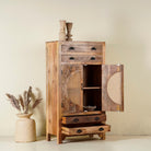 Handcrafted mango wood cabinet Agnayi with rattan inserts and floral carvings, rattan furniture for bohemian interior, 80 × 40 × 148 cm.