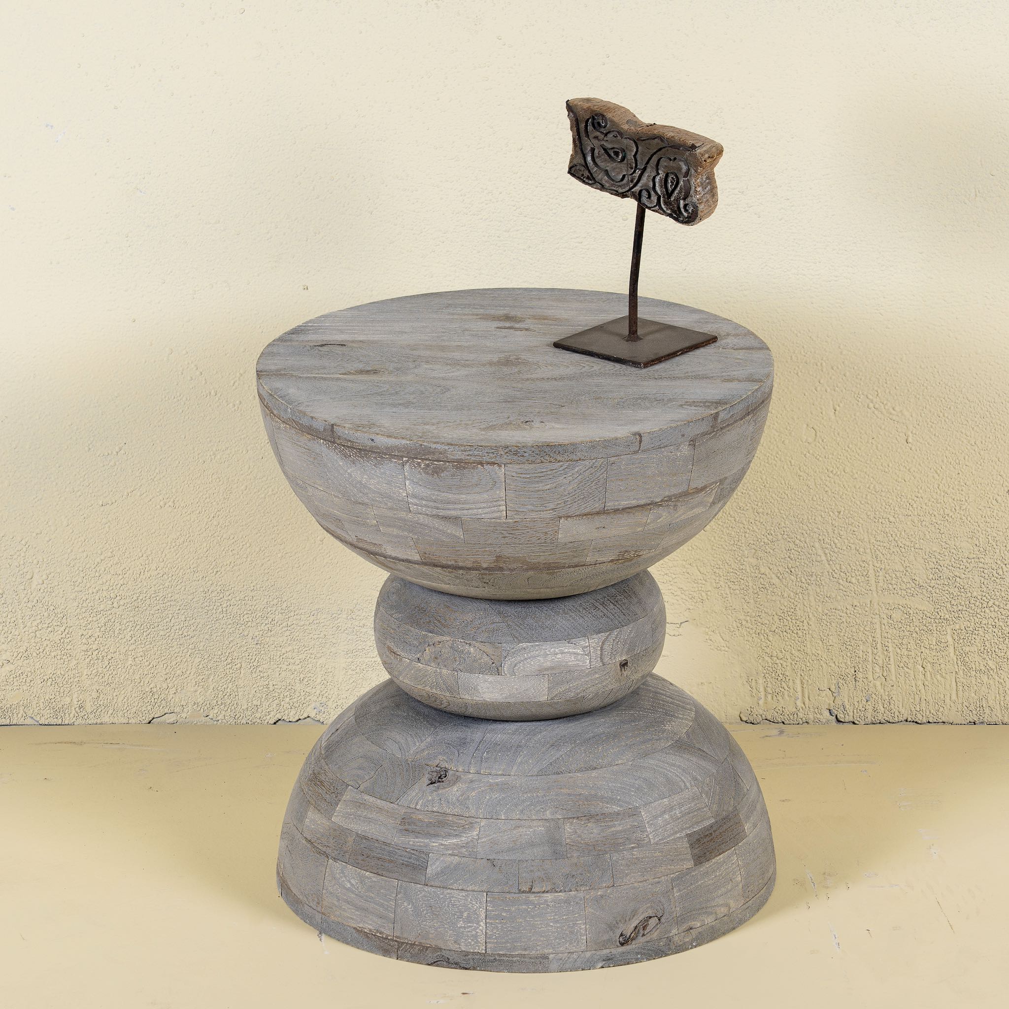 Hand-made side table made of mango wood in grey weathered look.