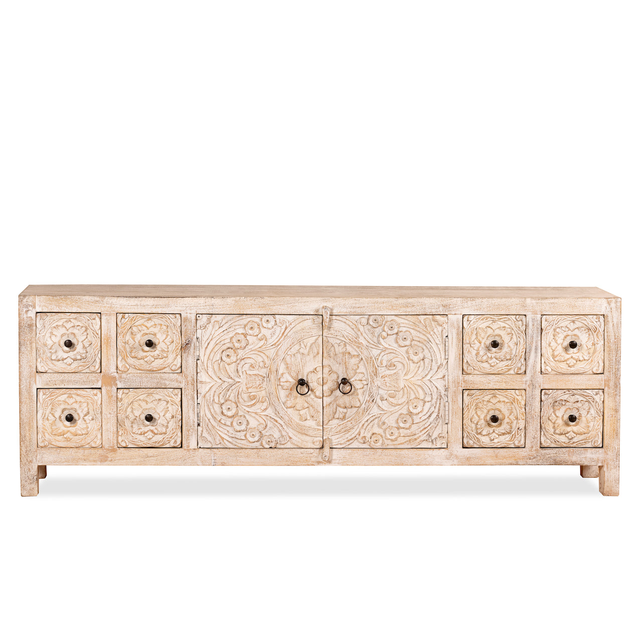 White background image of a whitewashed mango wood lowboard with hand-carved floral details, eight drawers and two compartments; ideal as a wooden lowboard or carved wood console table, 180 × 60 × 40 cm.