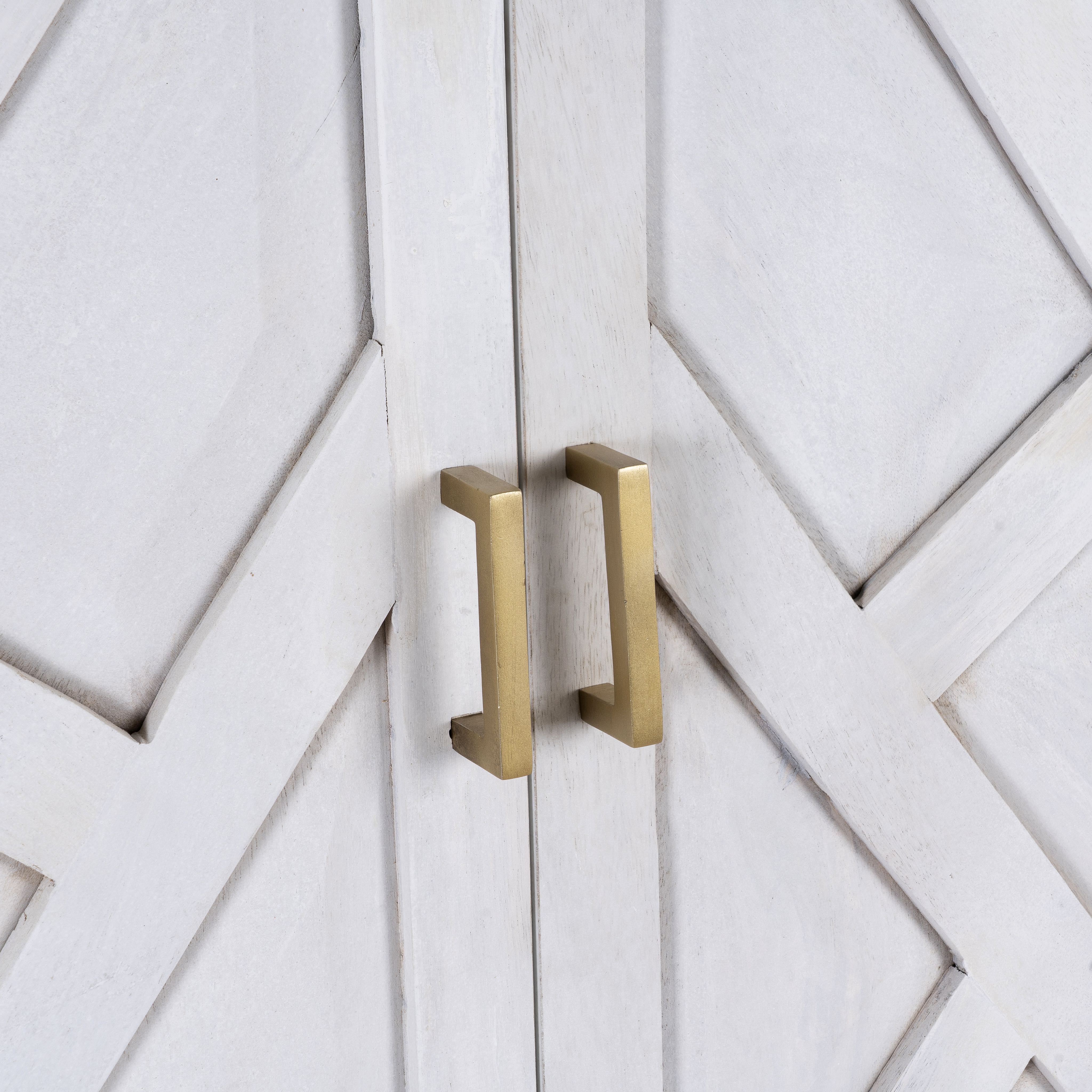 Close up image of a tall whitewashed mango wood cabinet with carved lines and antique brass iron base, 91 × 154 × 43 cm.
