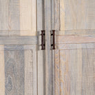 Close up image of a reclaimed wood wardrobe with panelled double doors and rustic finish; bathroom furniture with ample storage, 100 × 45 × 190 cm.