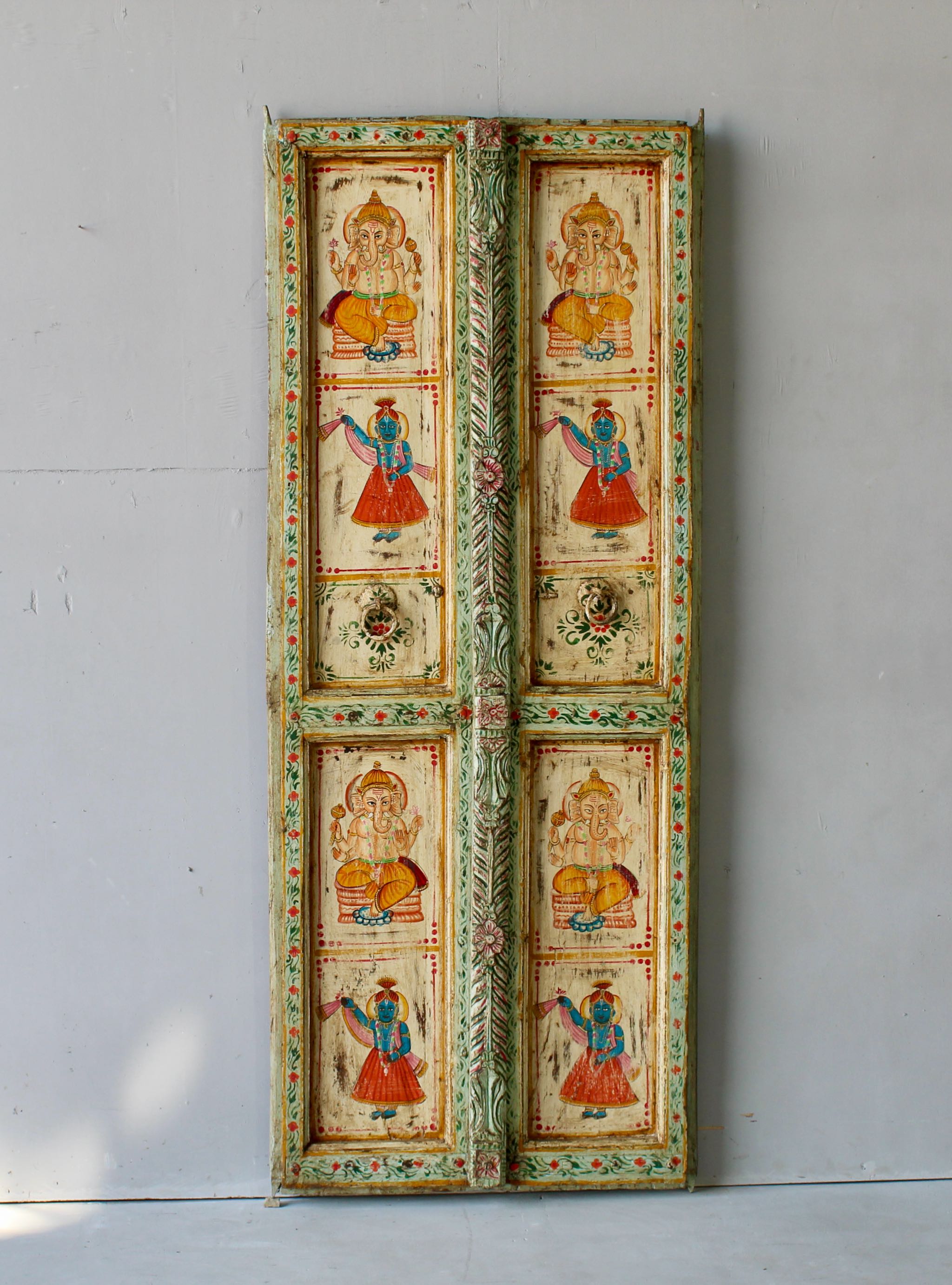 Hand-painted old Indian teak door panel with gods motifs in vintage style.