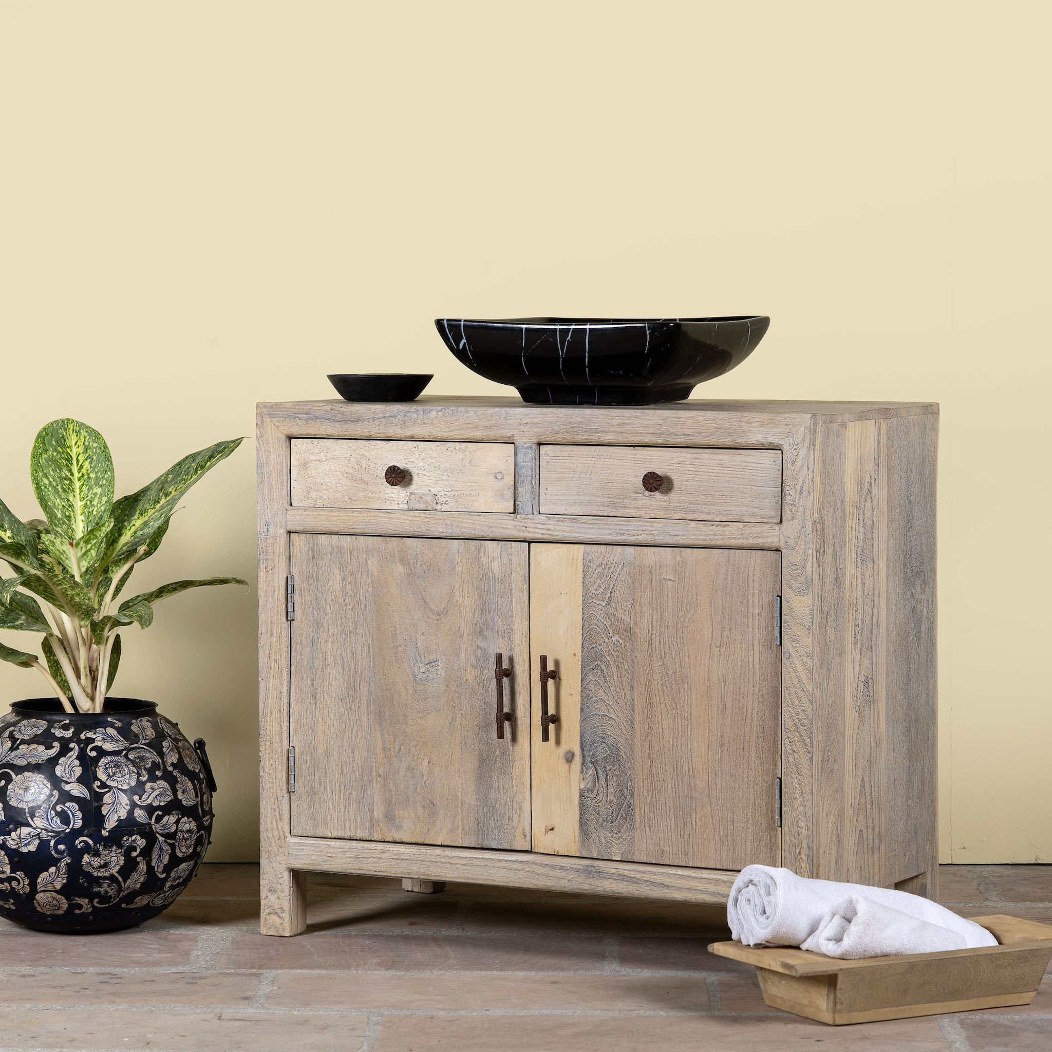 Side angle image of a reclaimed wood cupboard with 2 drawers and 2 doors, rustic finish; sustainable bathroom furniture, 90 × 50 × 80 cm.