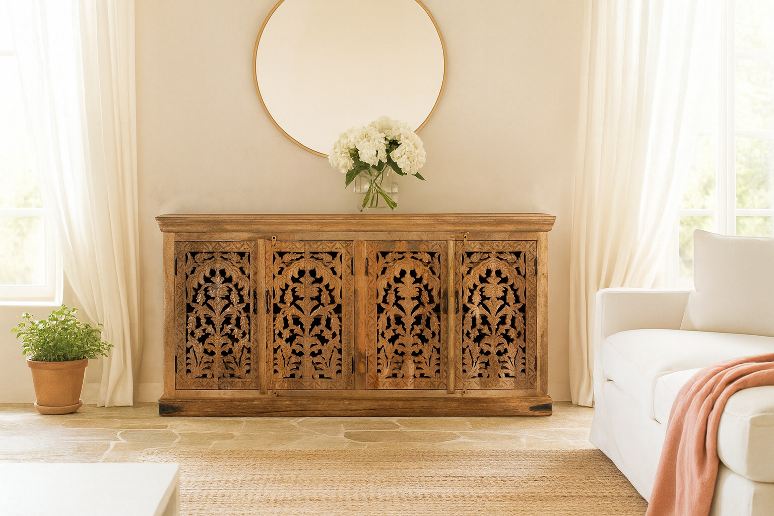 Lifestyle image of a hand carved mango wood sideboard Bagodara with whitewashed finish and intricate Indian patterns; ideal for bedroom furniture or as a hand carved sideboard, 180 × 90 × 40 cm.