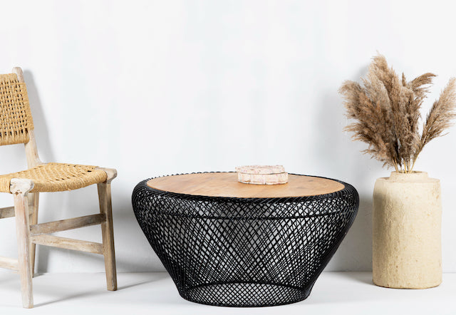 Large round metal base coffee table with recycled wooden top and woven iron base; minimalistic style coffee table, 100 cm diameter, 45 cm height.