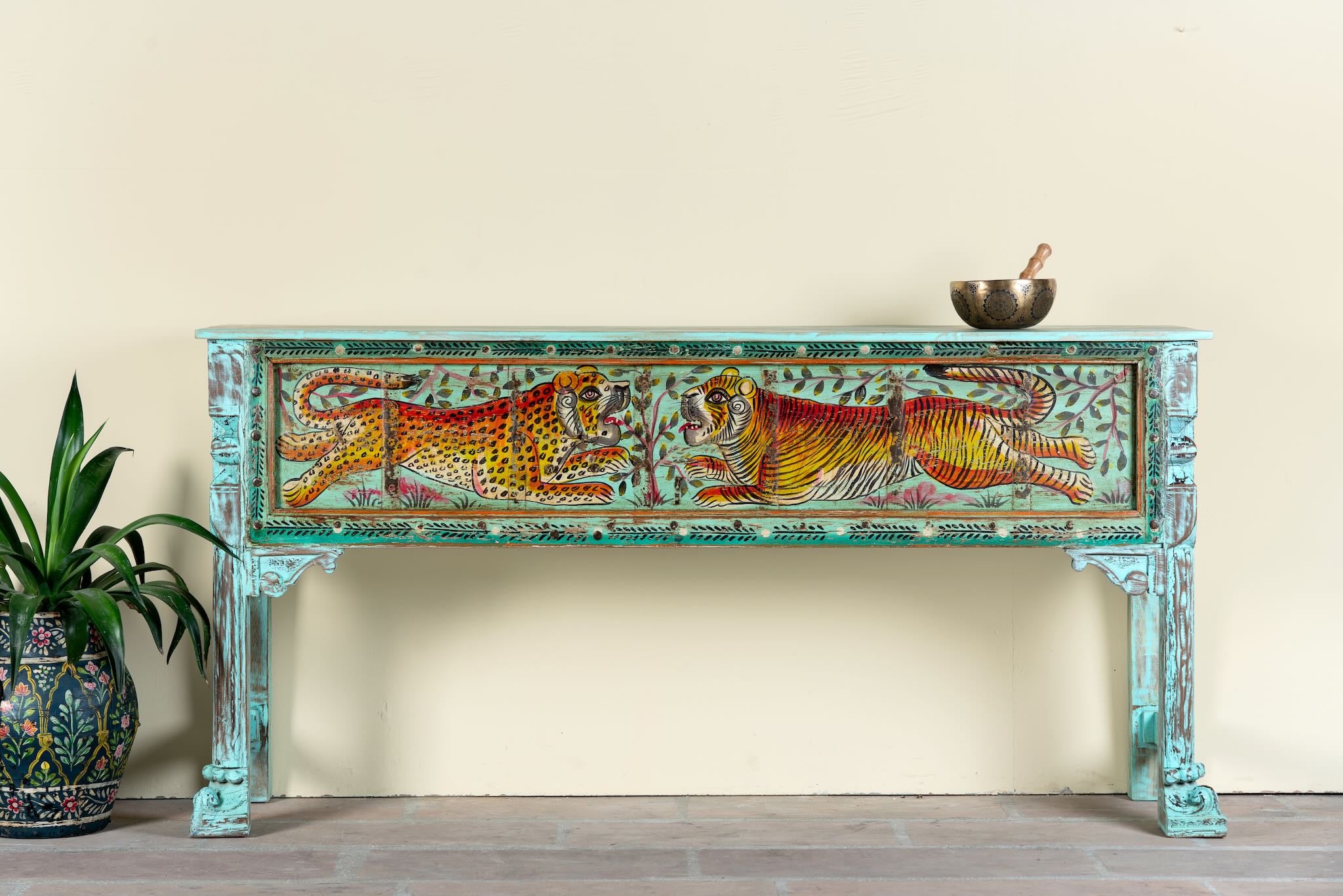 Hand-painted reclaimed wood console table Bunsee with tiger and leopard motifs in turquoise vintage finish. A unique piece of furniture for bohemian interiors and artistic spaces.
