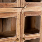 Close up picture of Chander tall vitrine with reclaimed teak door panels, a refined piece of teak wood furniture for living room furniture collections.