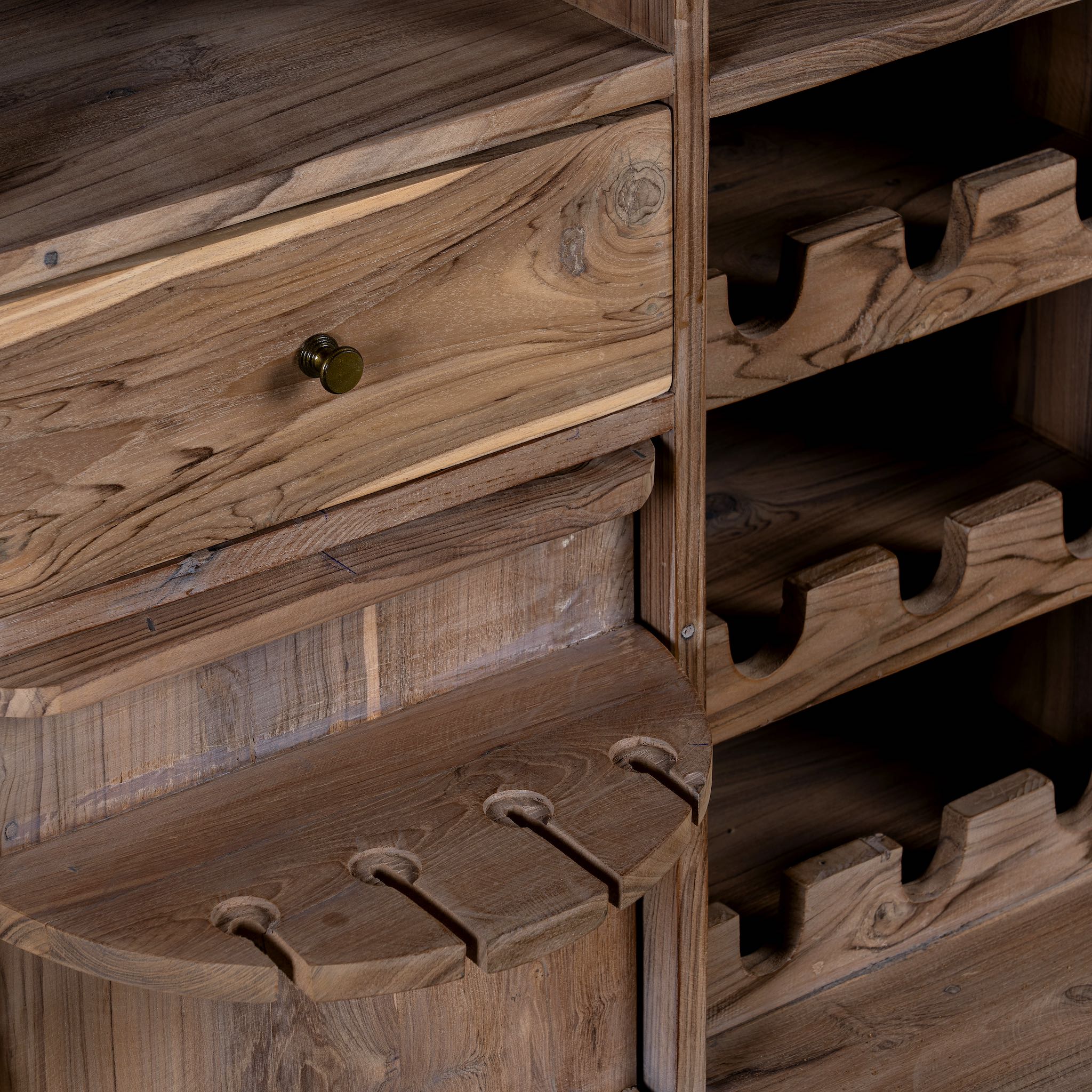 Foldable bar table made of reclaimed teak wood with inside storage.