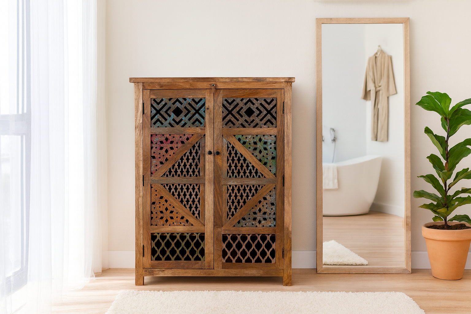 Lifestyle imagination of a handmade mango wood cabinet with carved floral and geometric lattice doors, distressed colour accents; artisanal furniture perfect for boho style interiors, 100 × 45 × 130 cm.