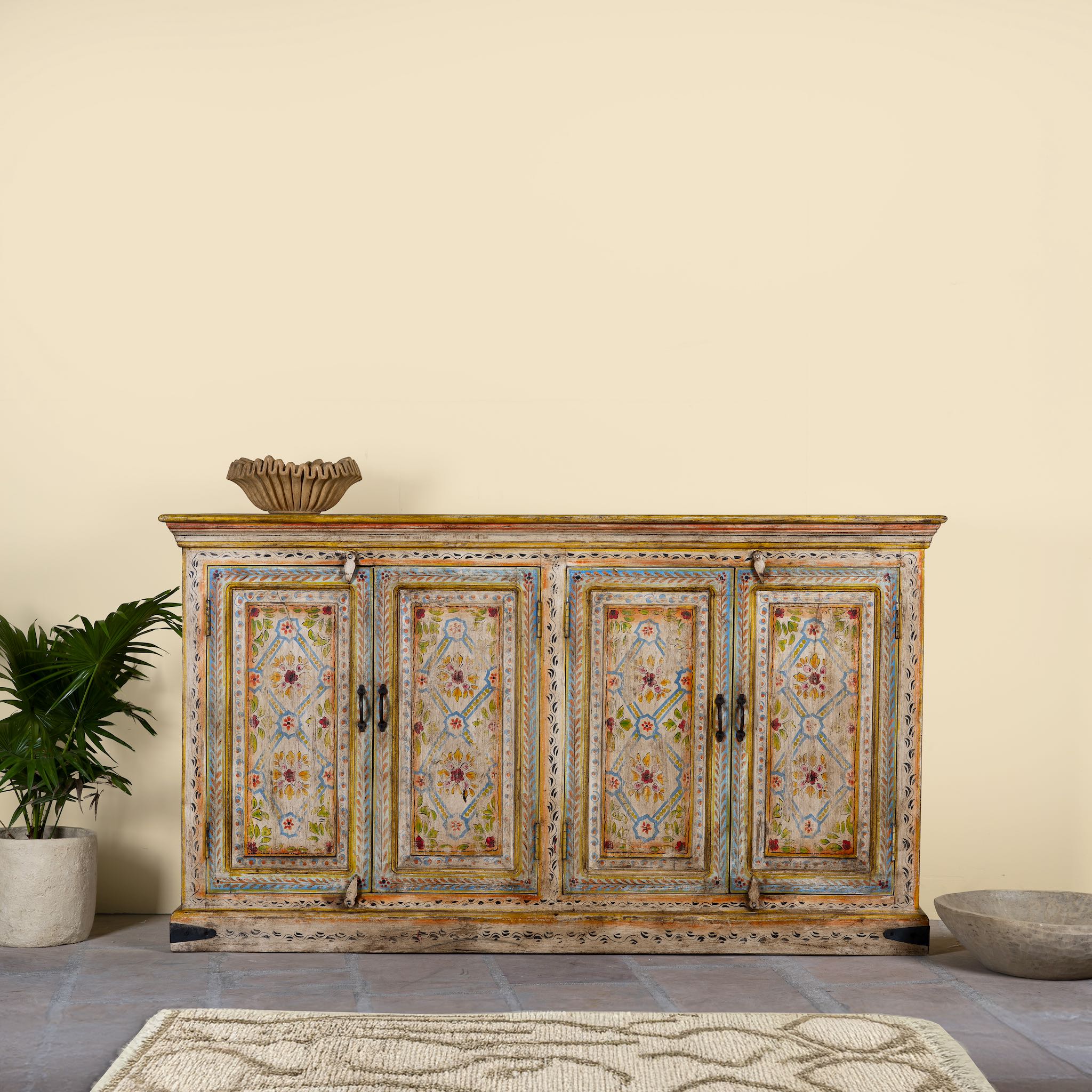 Hand painted wooden dresser with floral and geometric motifs, reclaimed wood living room furniture in vintage boho style, 170 × 45 × 95 cm.