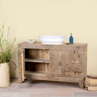Open door image of a reclaimed wood sideboard made from antique teak doors with carved detailing; teak furniture, 134 × 37 × 82 cm.