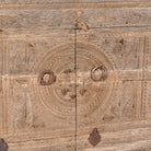 Close up image of Etasha, a reclaimed wood sideboard made from antique teak doors with carved detailing; teak furniture, 130 × 38 × 83 cm.