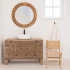 Lifestyle imagination of a reclaimed wood sideboard made from antique teak doors with carved detailing; teak furniture, 130 × 38 × 83 cm.