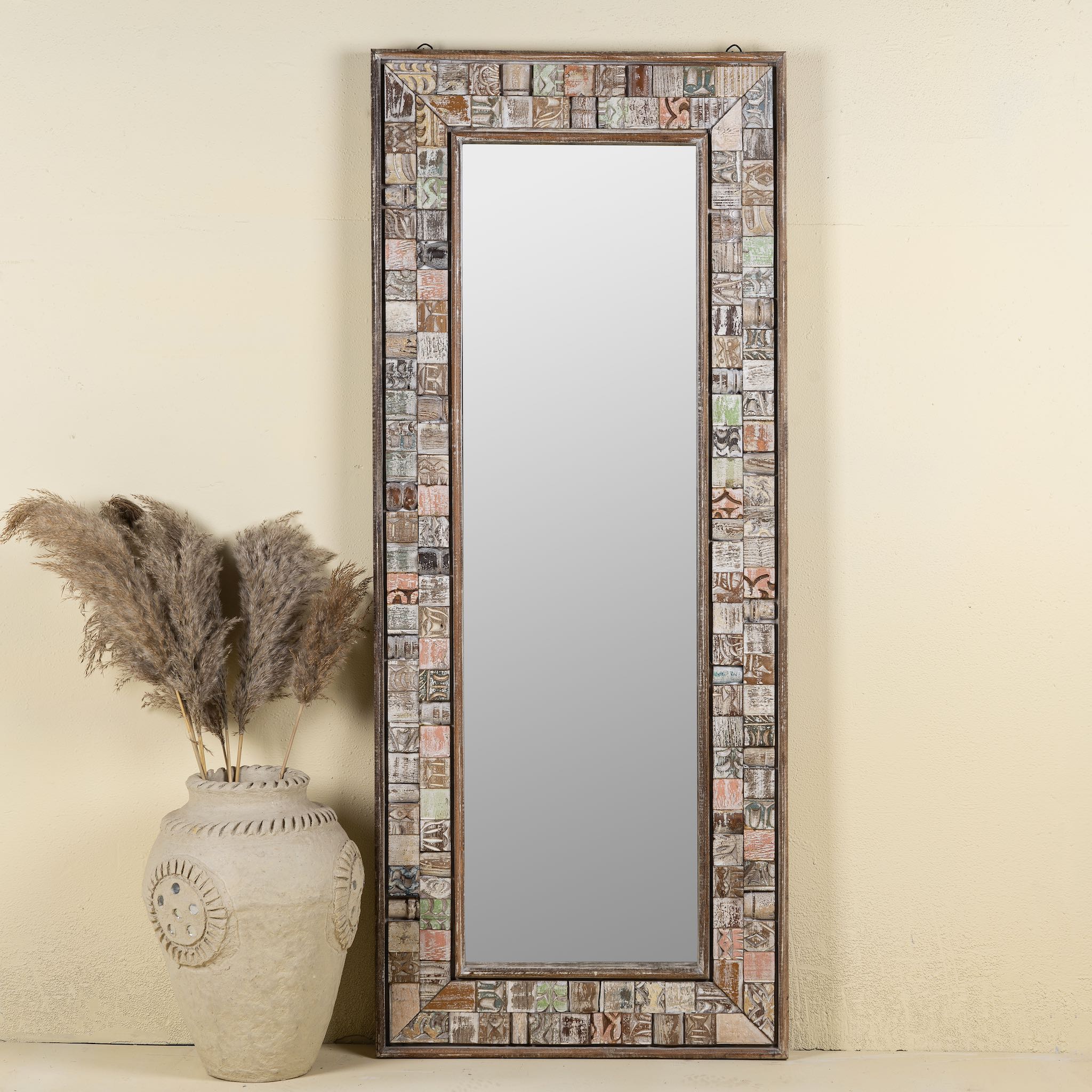 Handmade mango wood mirror with patchwork reclaimed frame, distressed vintage finish; perfect for vintage home decor, 60 × 5 × 145 cm.