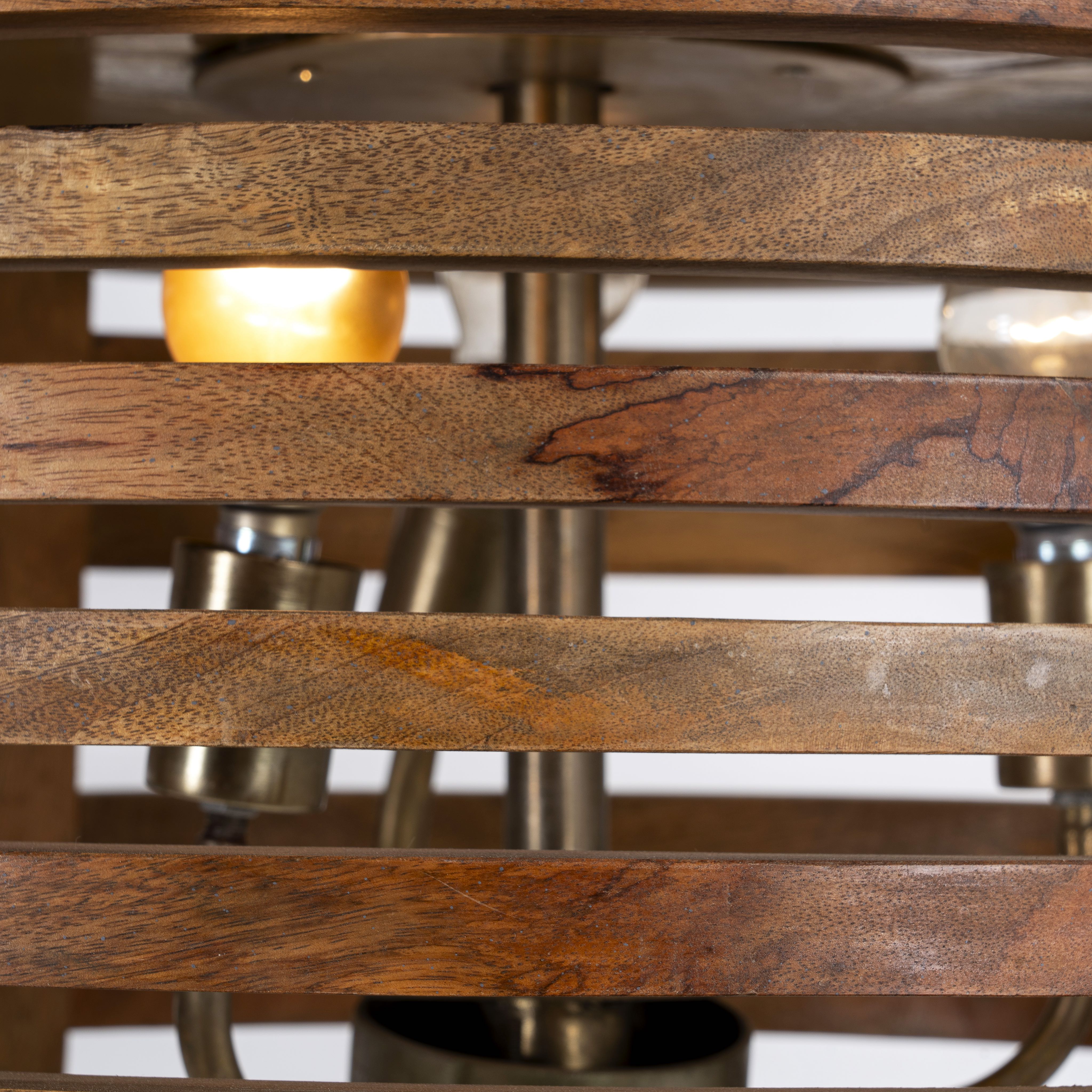 Close up image of a multi-ring rustic pendant lamp made of mango wood with brass accents – a minimalistic style lighting piece ideal for dining areas, kitchens, or stylish open spaces.