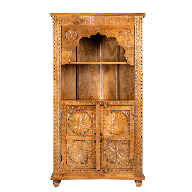 White background image of a hand-carved mango wood shelf with floral detailing, open shelf, and carved legs – carved wooden furniture in honey finish for rustic and Mediterranean interiors.