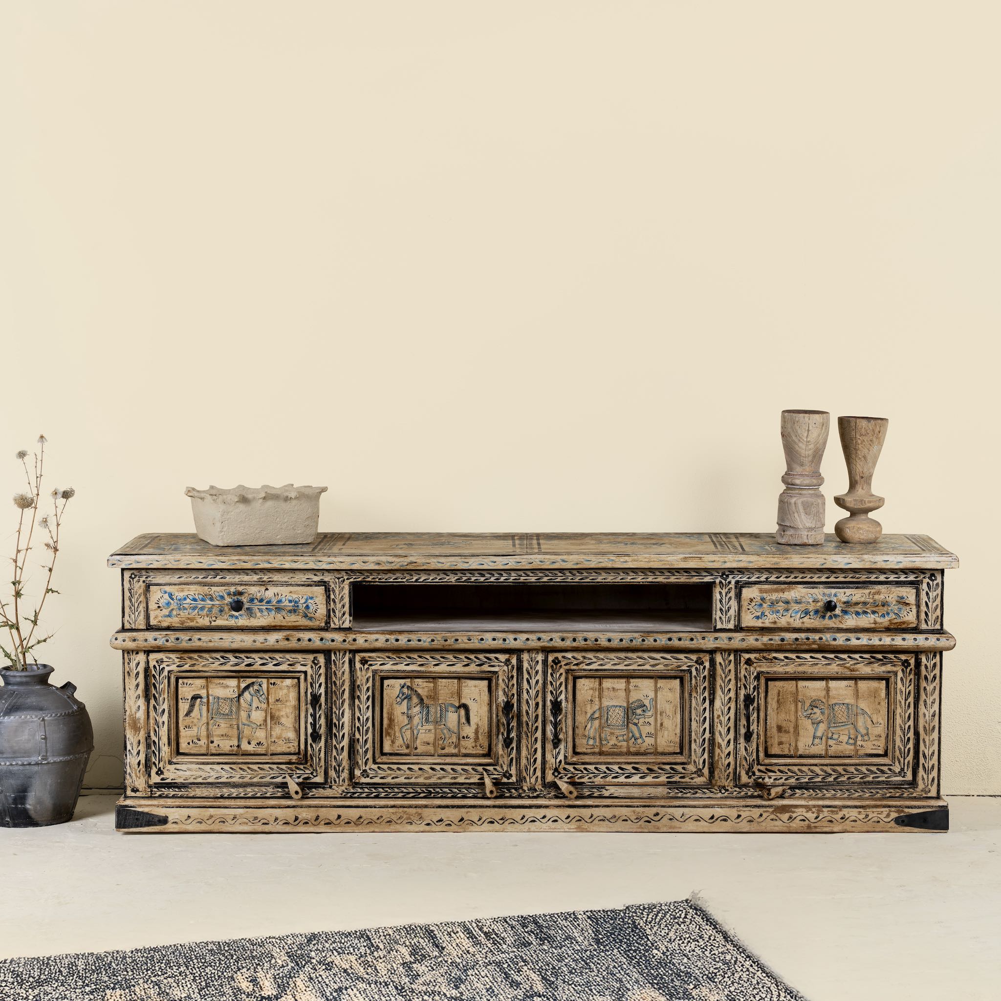 Hand painted TV unit in reclaimed wood with Indian elephant and horse motifs, drawers and cabinets, 180 × 45 × 60 cm.