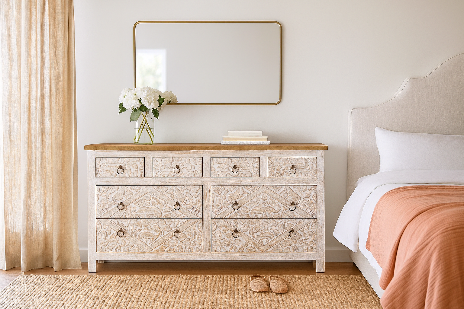 Lifestyle image of a hand-carved mango wood sideboard with elephant motifs and whitewashed finish; ideal for vintage home decor, 153 × 80 × 40 cm.