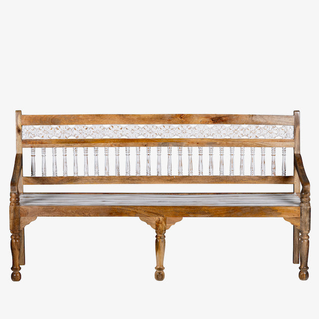 White background image of a and carved mango wood bench with floral backrest and spindle accents; rustic mango wood seating, 176 × 56 × 95 cm.