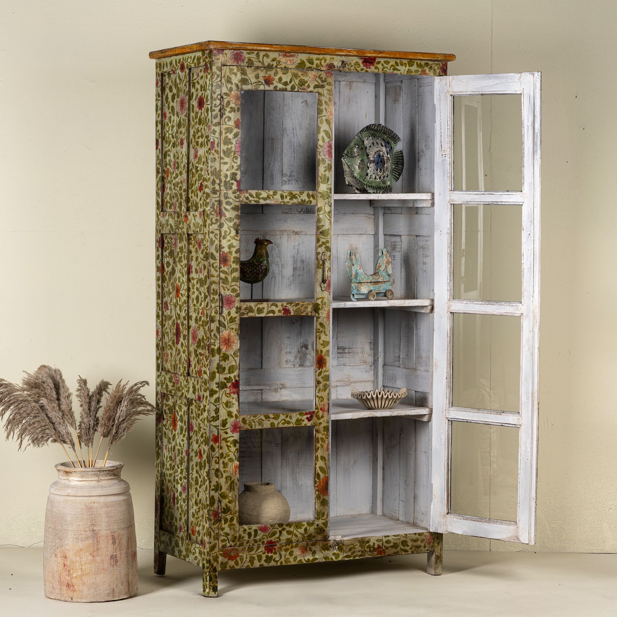 Open door image of a hand-painted reclaimed wood showcase cabinet with floral motifs and glass doors, sustainable furniture and vintage home decor style, 95 × 48 × 183 cm.