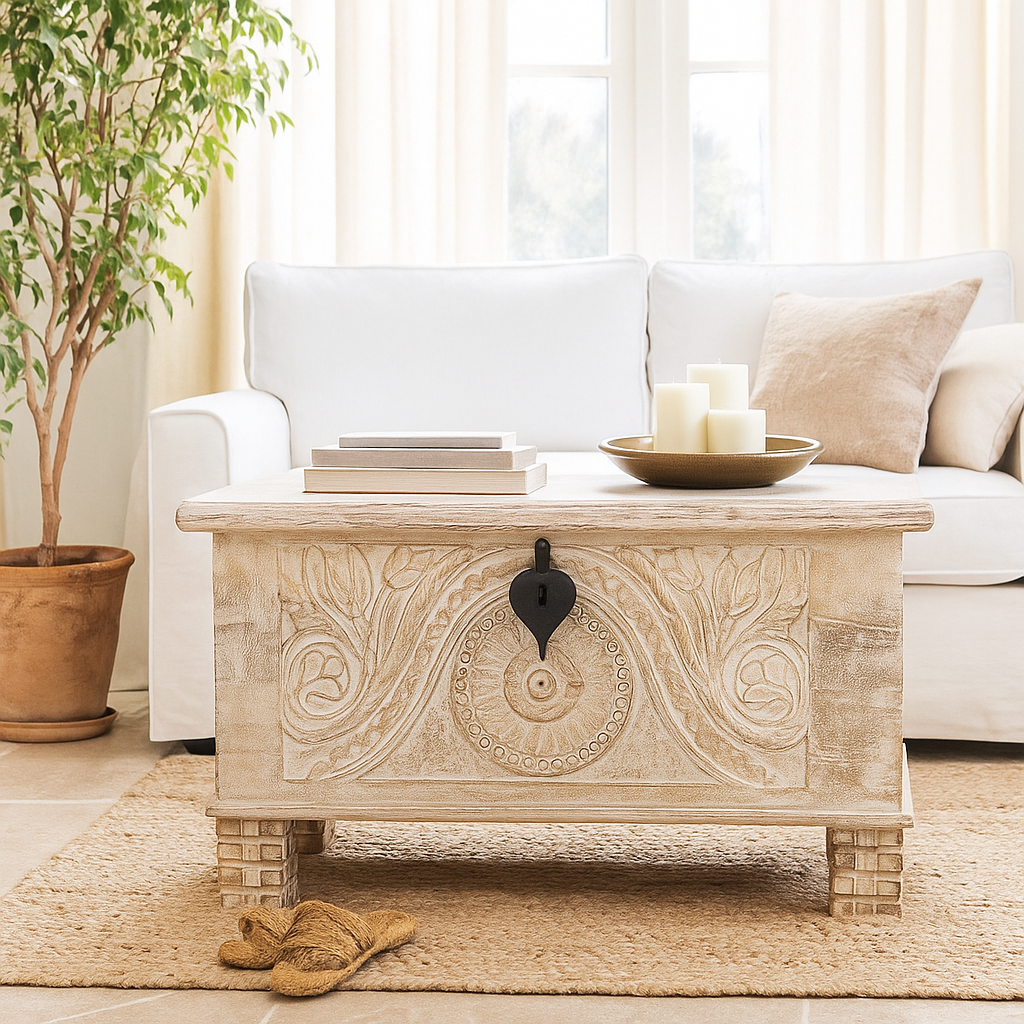 Lifestyle image of a hand‑carved mango wood chest with floral detailing – vintage home accessories and artisan storage chest for stylish interiors.