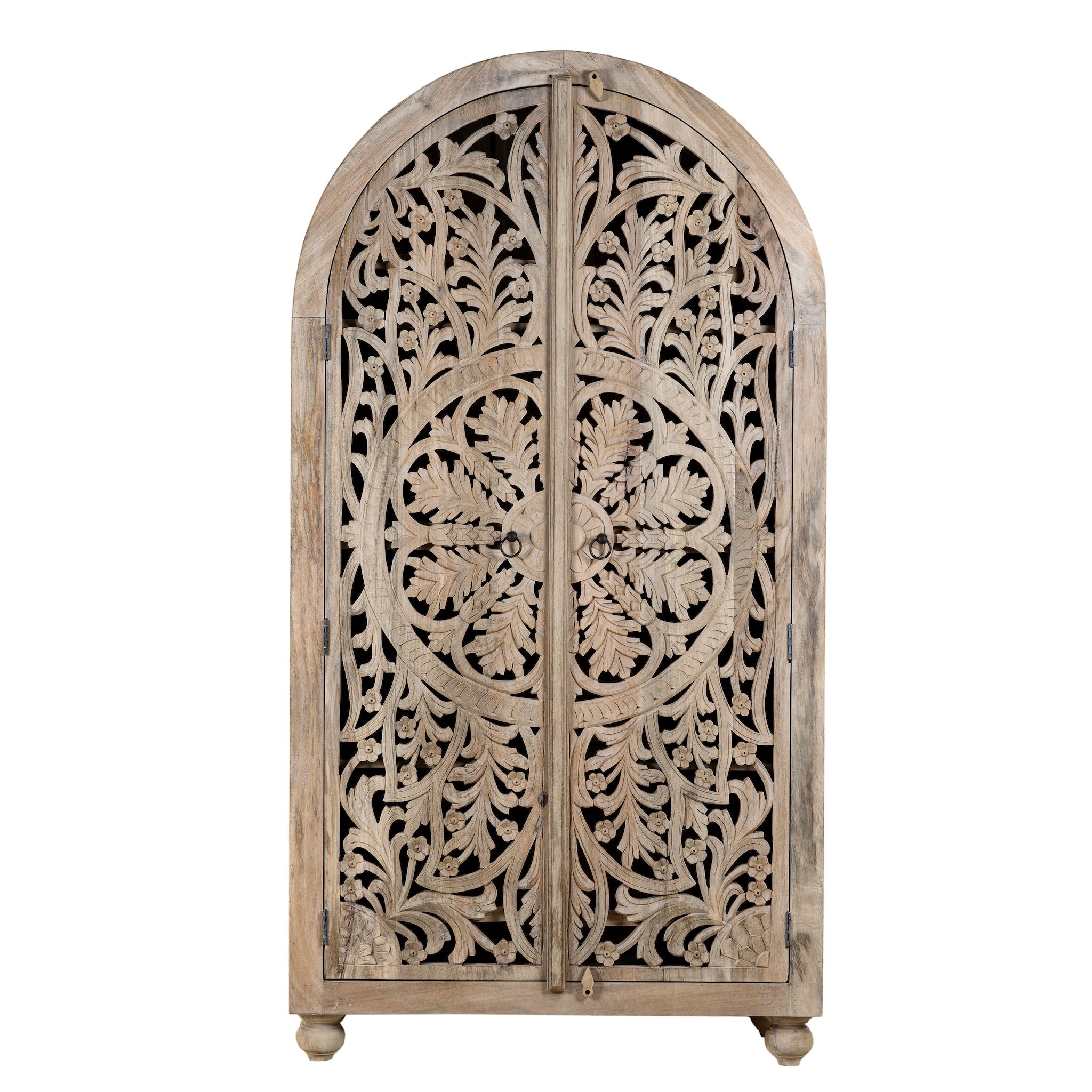 White background image of a hand-carved mango wood wardrobe, a statement piece of bedroom furniture ideal for a bohemian interior.