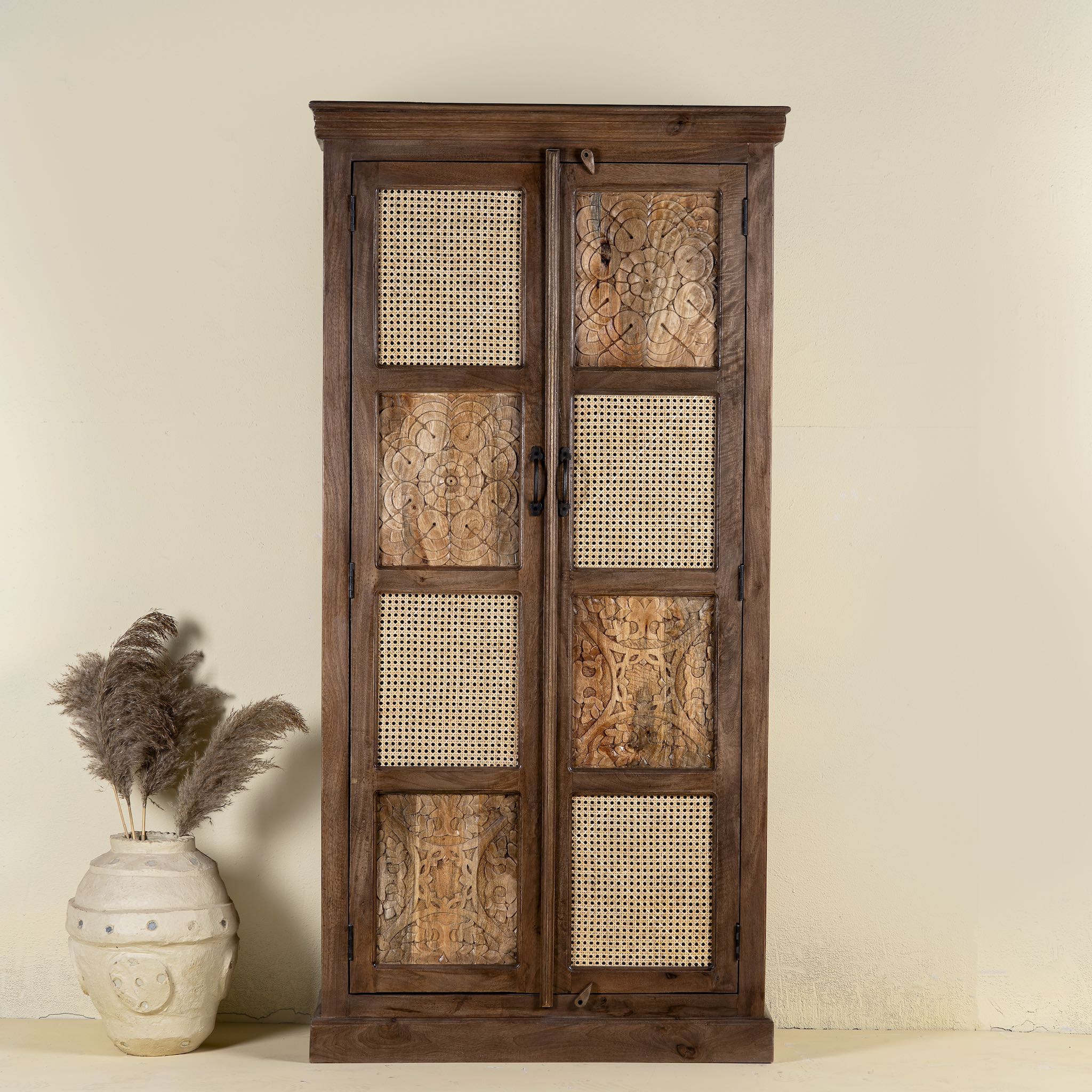 Tall mango wood furniture cabinet with hand-carved details and woven rattan doors, artisan rattan furniture, 90 × 40 × 180 cm.