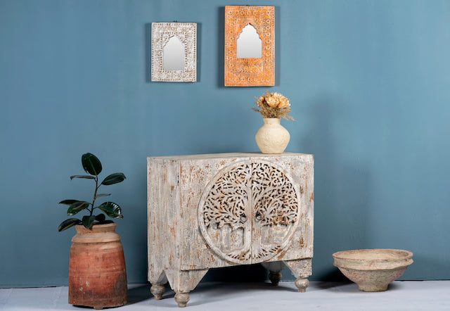 Side angle image of a Mango wood cabinet under sink with carved tree design on front, 90 × 80 × 40 cm.