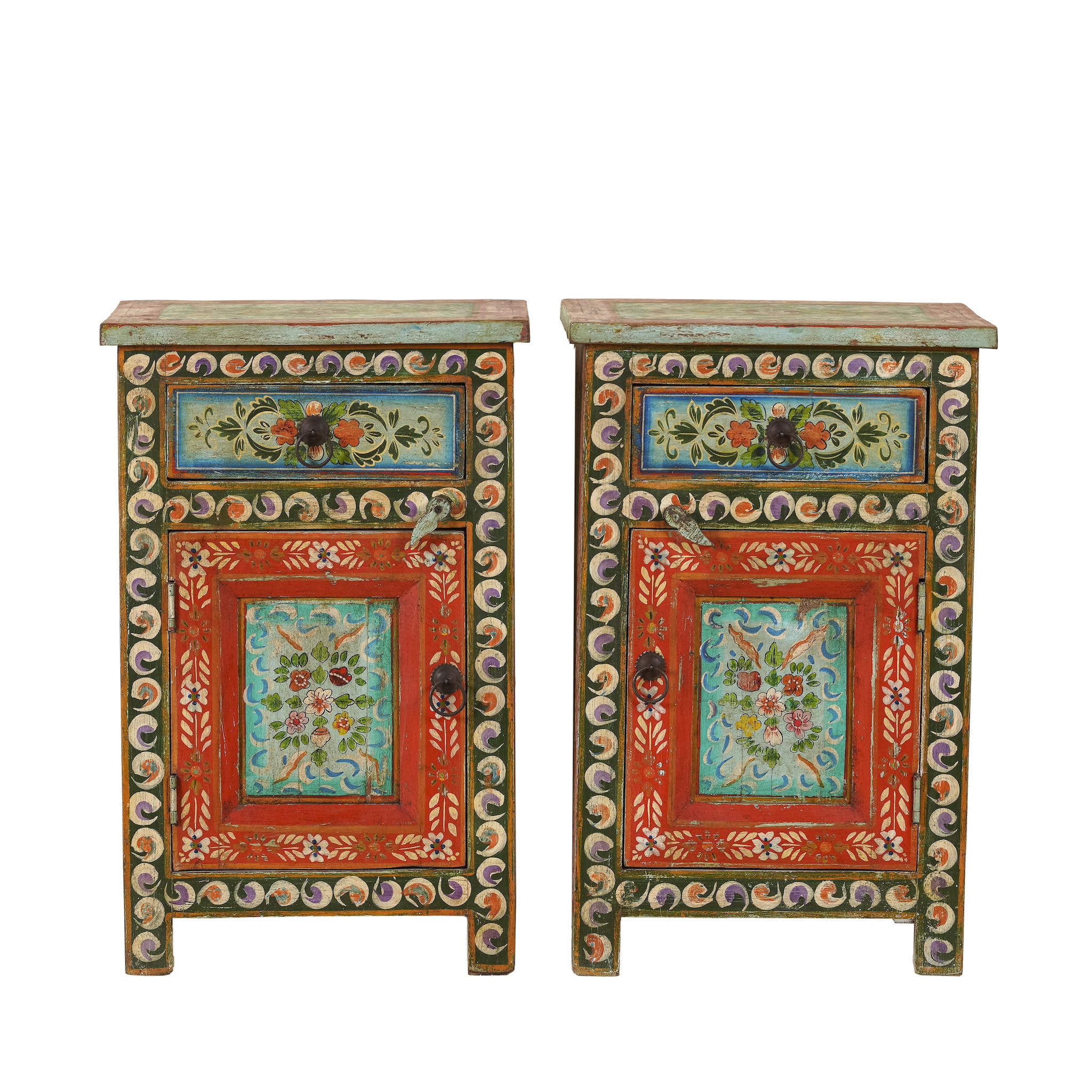 White background image of a hand-painted bedside tables made from recycled wood – vintage night stands with carved mango wood furniture detailing and floral artistry.