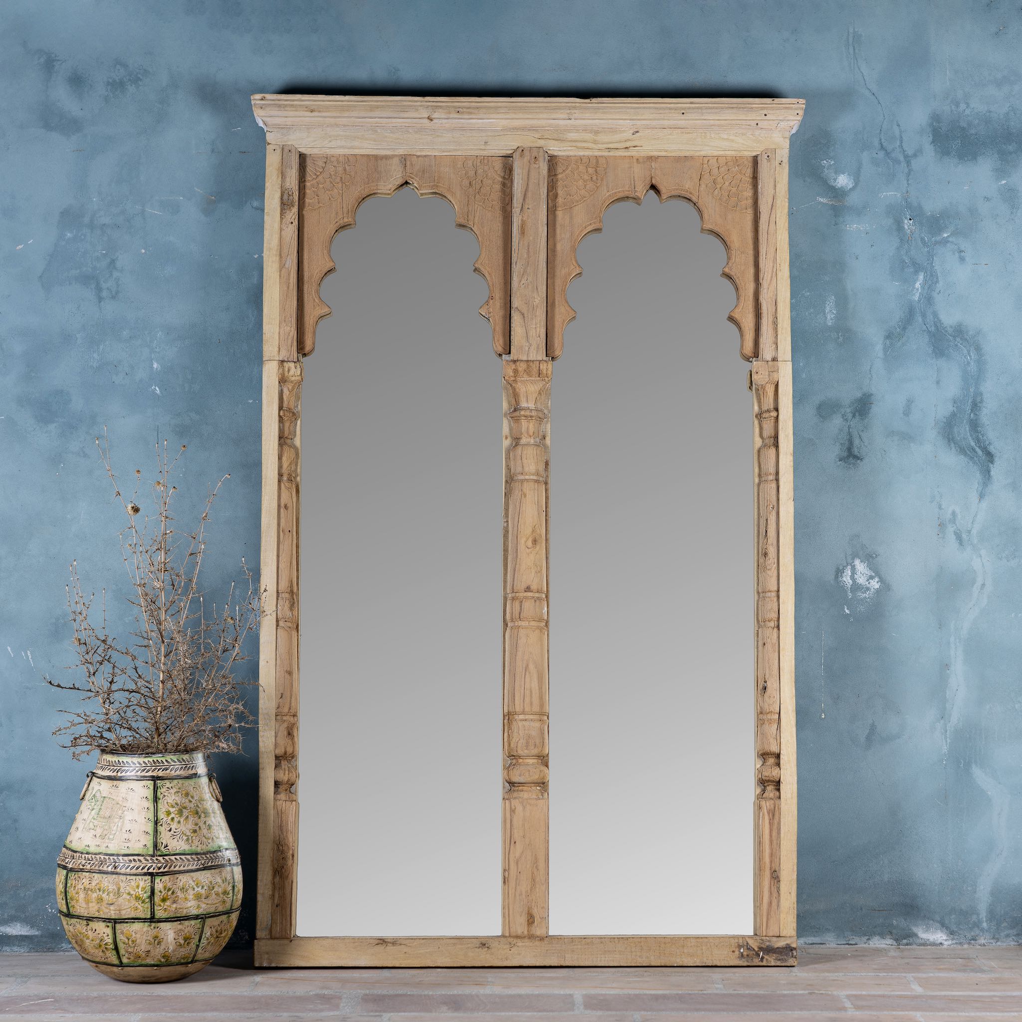 Large arched teak wall mirror in Boho style, repurposed from antique double window frame, part of our vintage furniture collection.