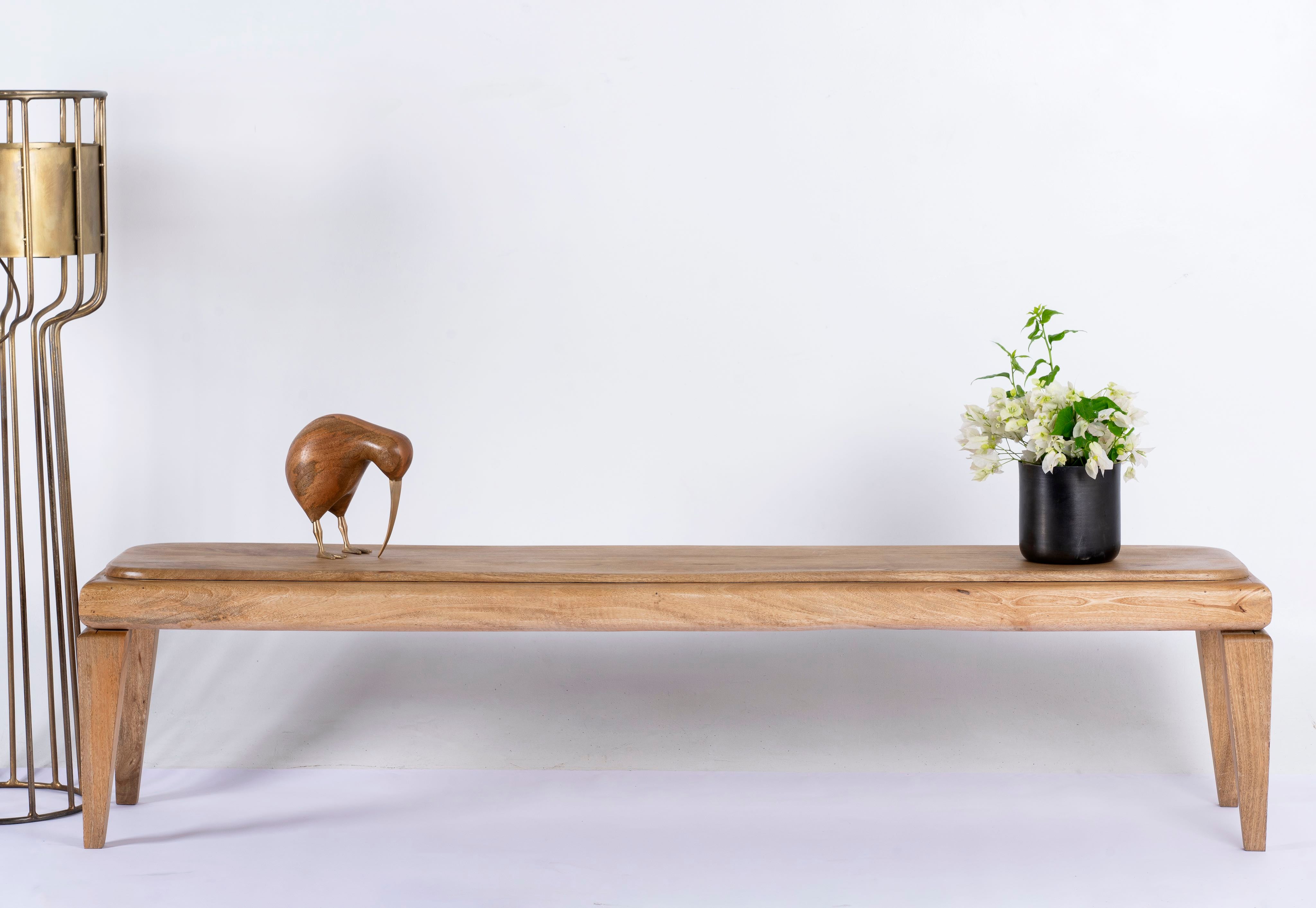 Minimalistic mango wood bench with natural finish and clean design; versatile wooden seating, 180 × 41 × 44 cm.
