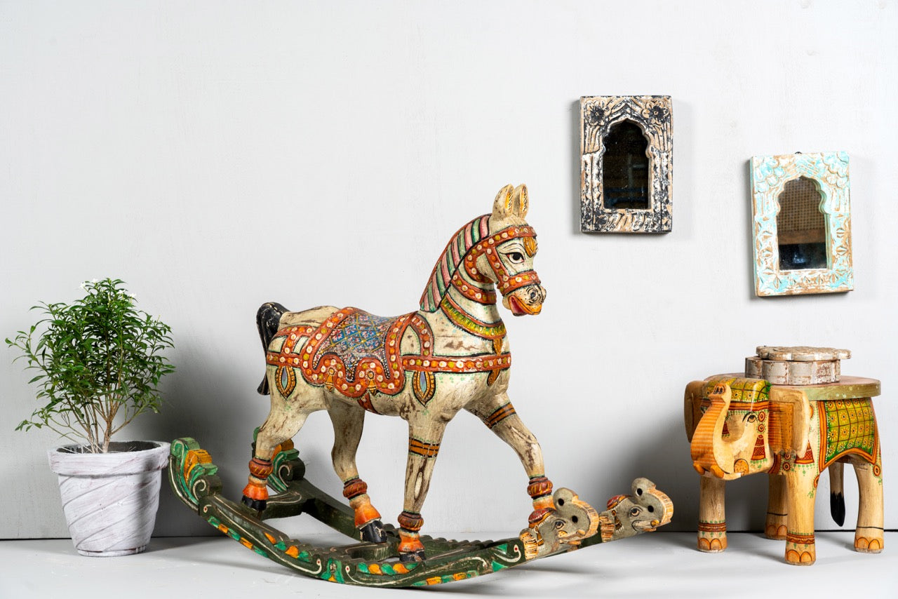 Hand-painted mango wood rocking horse “Gita” in Rajasthani style – colourful Indian home accessory and mango wood decor piece, 104x78x30cm.