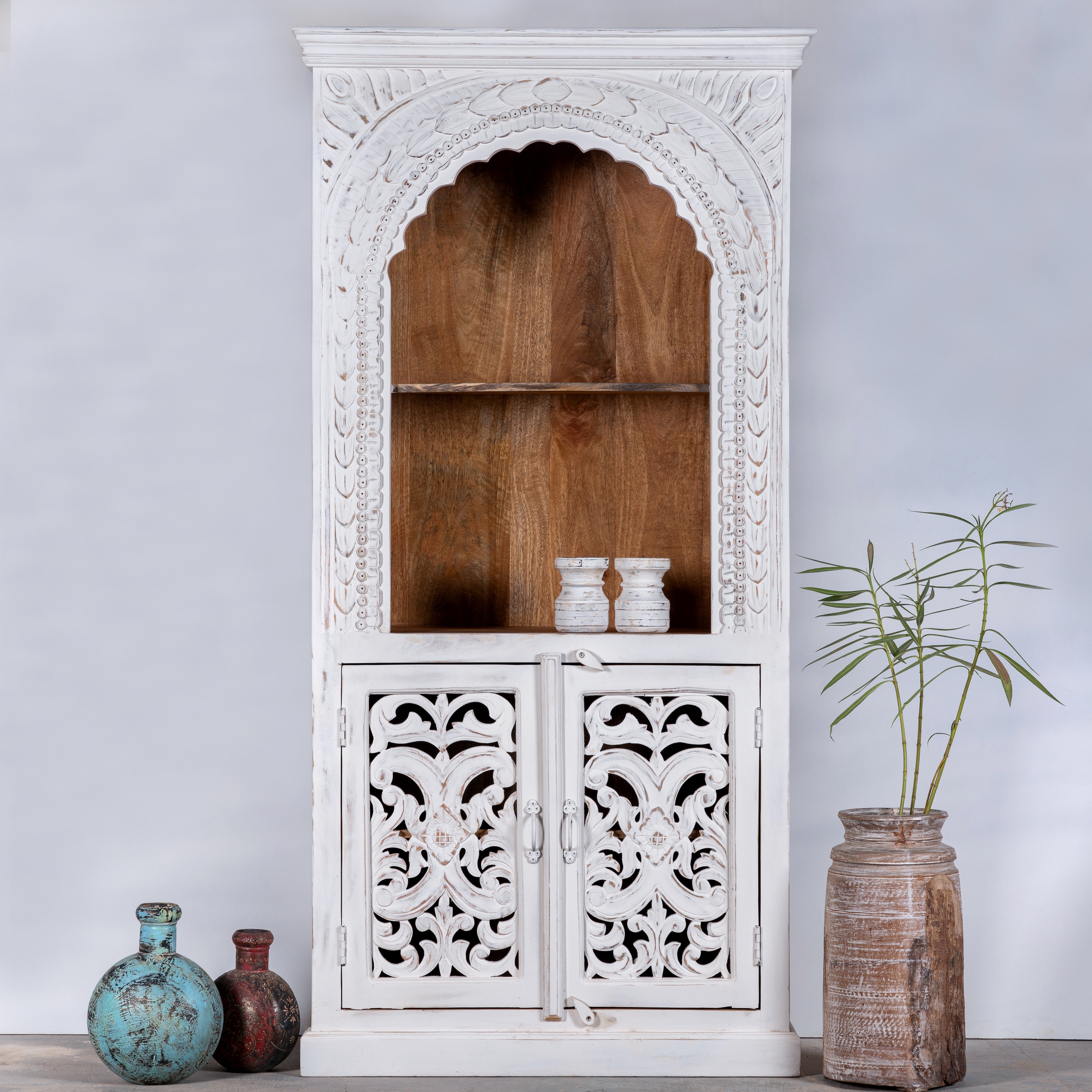 Hand-carved mango wood shelving unit with white washed finish and storage compartments – white washed wooden furniture ideal for vintage home accessories and Indian decor style.