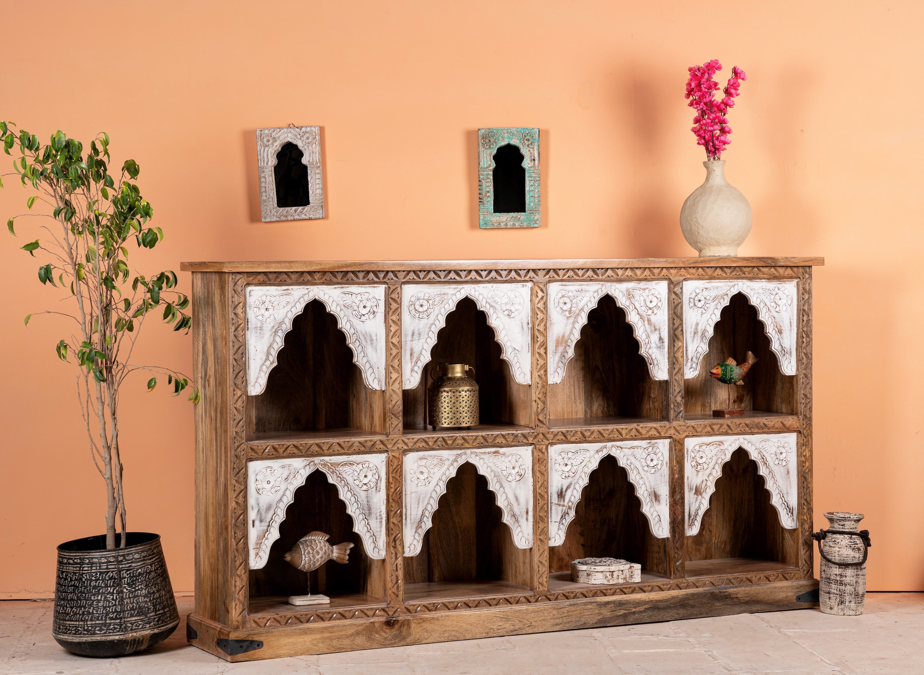 Side angle image of a hand-carved mango wood console table with floral patterns and whitewashed arches; ideal as entryway table vintage or carved console table, 200 × 110 × 37 cm.