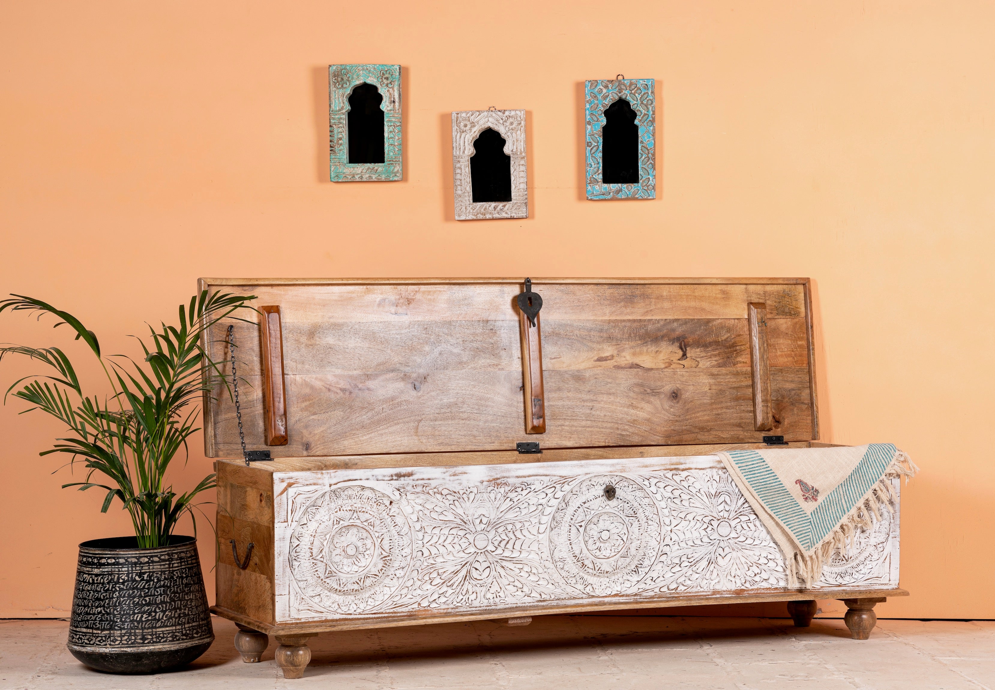 Open top image of a long mango wood vintage display box and wood chest box with hand‑carved circular motifs, iron fittings and whitewashed finish; 180 × 55 × 46 cm.