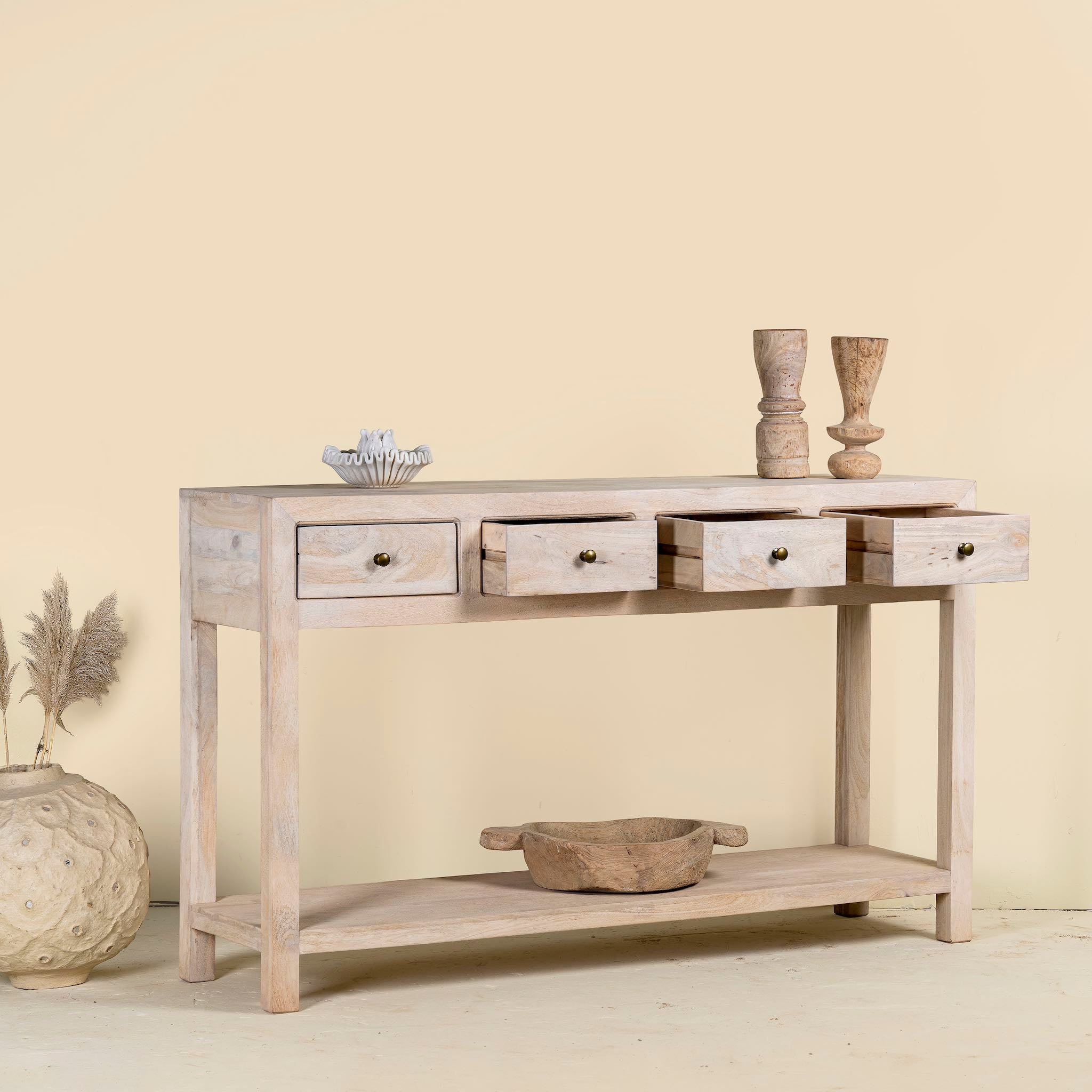 Open Drawer image of a sandblasted mango wood console table in Ibiza style with four drawers and lower shelf.