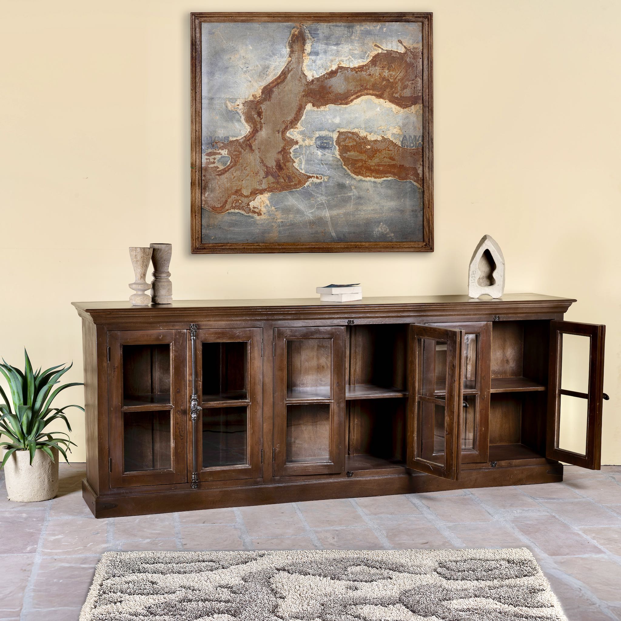 Open door image of a large reclaimed wood sideboard in rustic boho style with six glass-panelled doors, 257×46×100 cm.