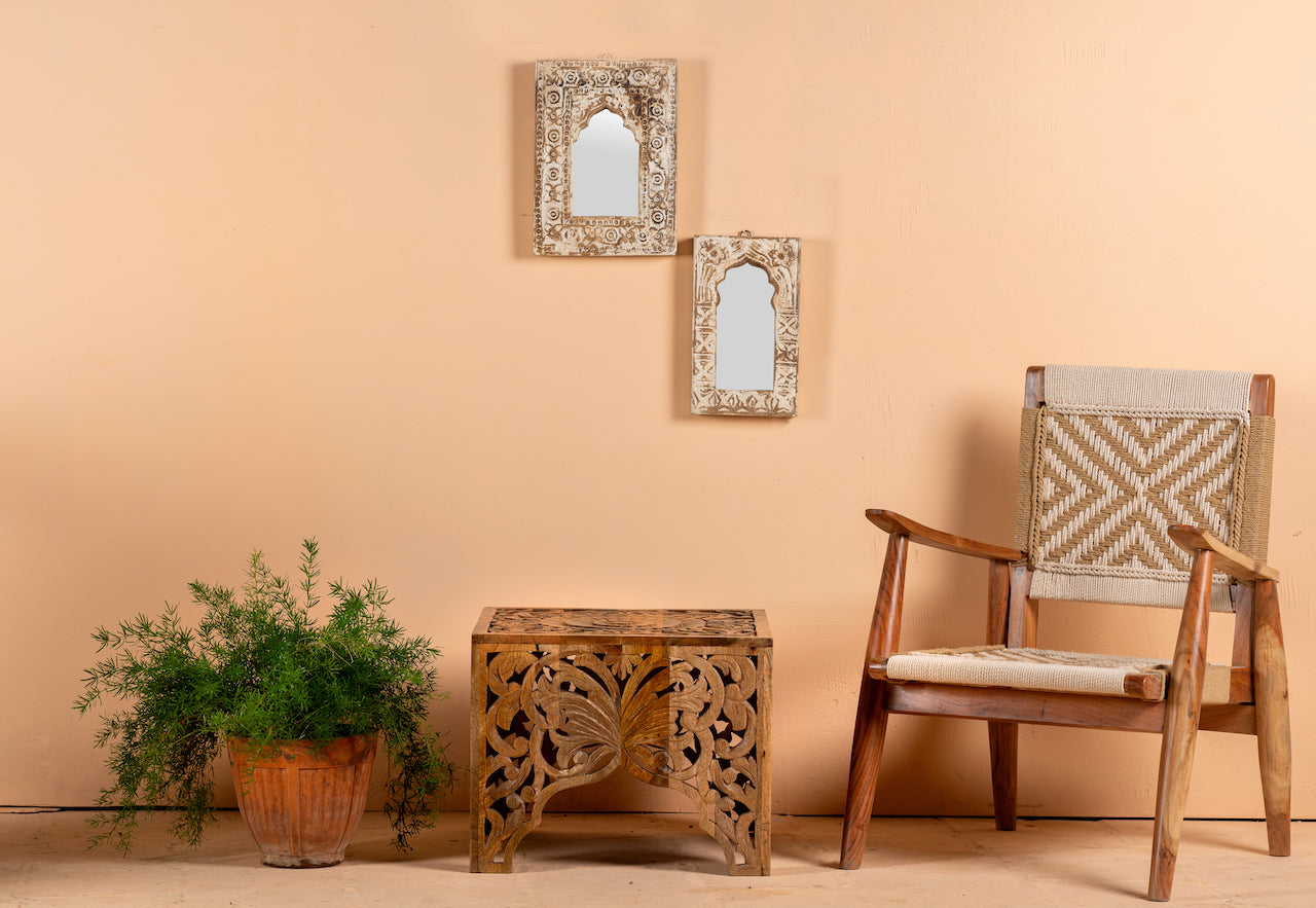 Square hand carved coffee table made from solid mango wood with intricate detailing; compact and rustic, 50 × 50 × 40 cm.
