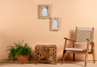 Square hand carved coffee table made from solid mango wood with intricate detailing; compact and rustic, 50 × 50 × 40 cm.