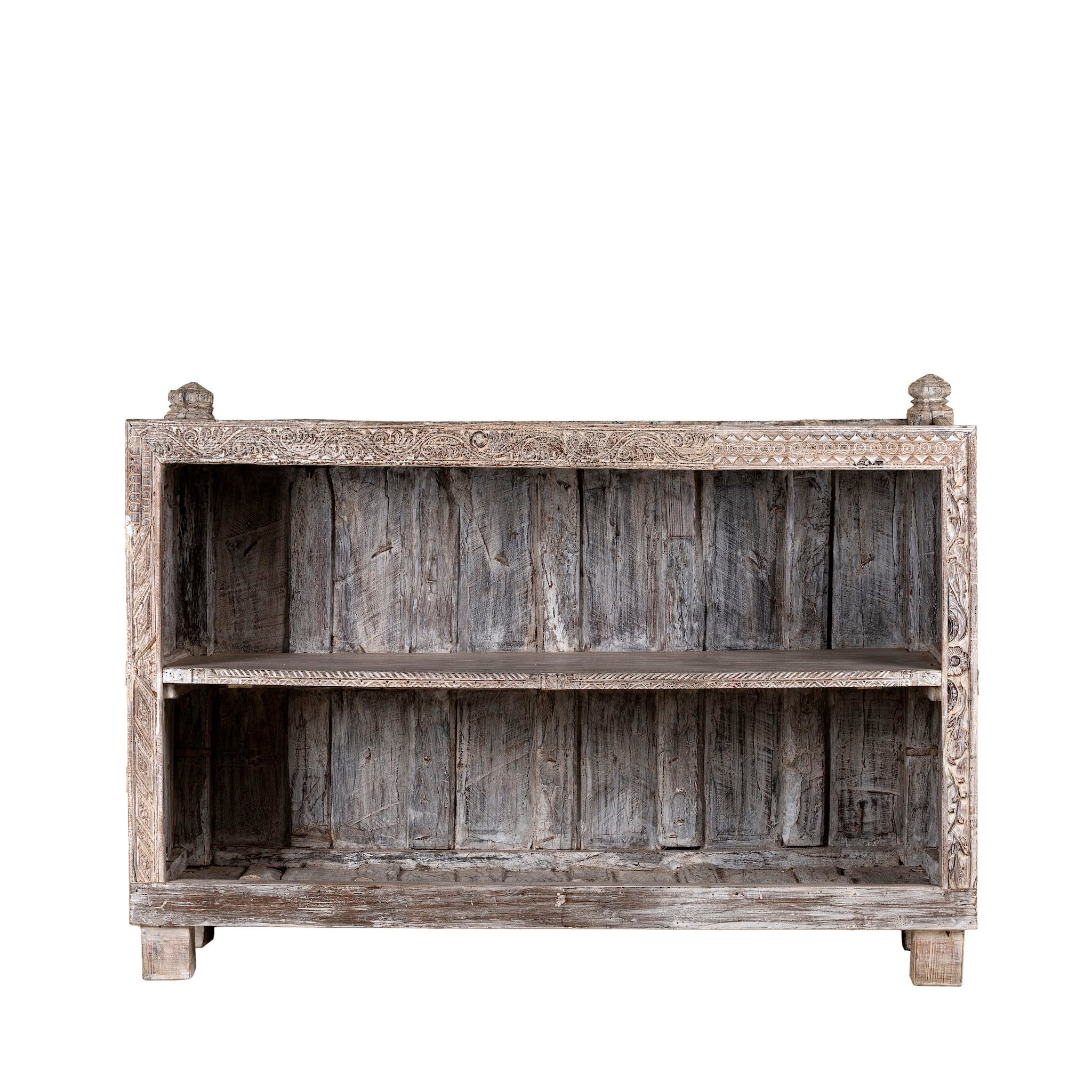 White background image of an antique console table wood counter with open shelves, a one-of-a-kind teak piece of unique furniture.