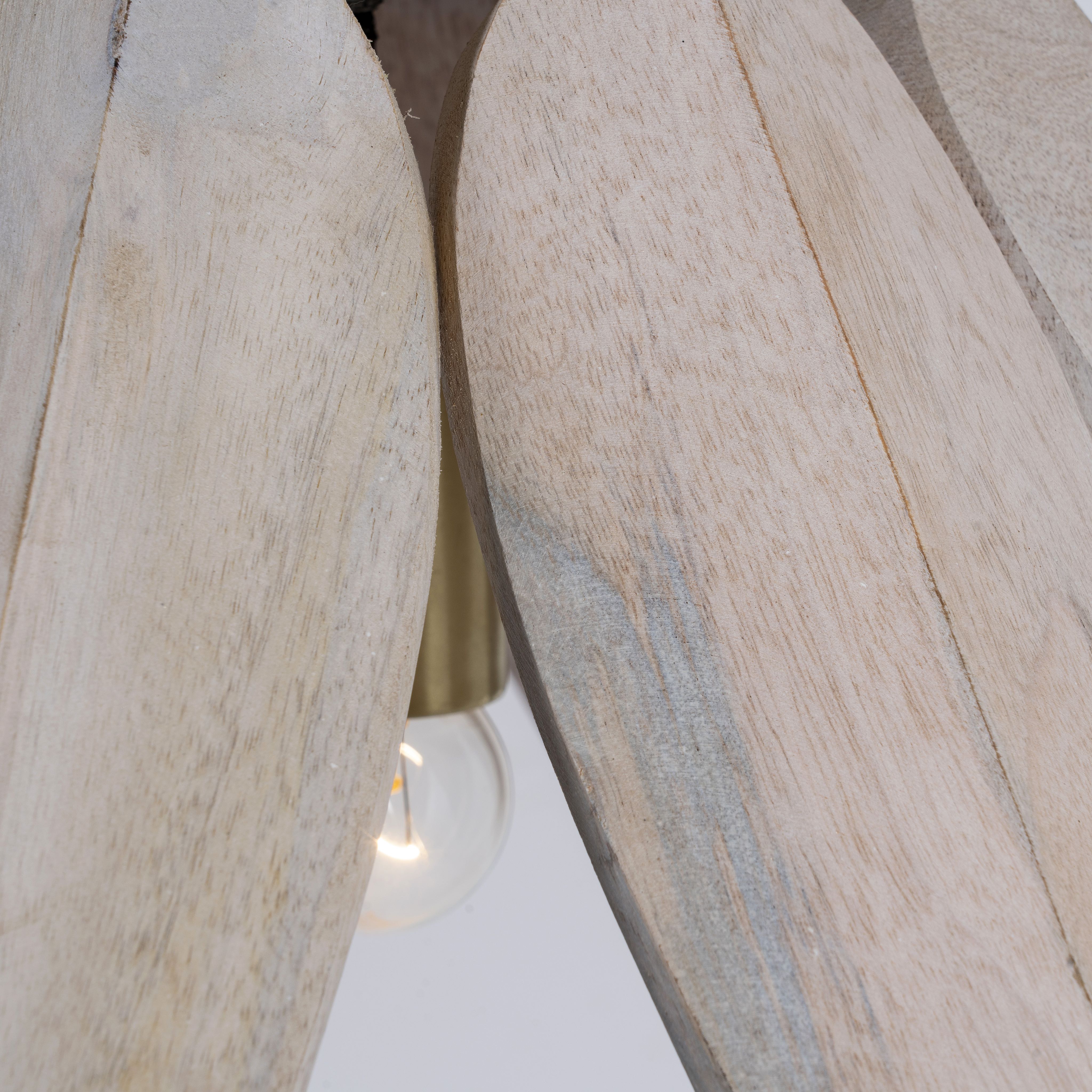 Close up image of a vintage pendant lamp made from white-washed mango wood in a floral design, suspended by a brass-plated hanger – elegant mango wood lighting for bedrooms, living rooms, or dining areas.