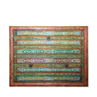 White background image of a Cauvery hand painted head board made from an antique Indian teak door, featuring traditional floral motifs in blue and cream and original iron hardware—an elegant example of hand painted head boards and authentic Indian headboards.