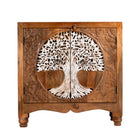 White background image of a  mango wood cupboard with hand carvings in tree of life design.
