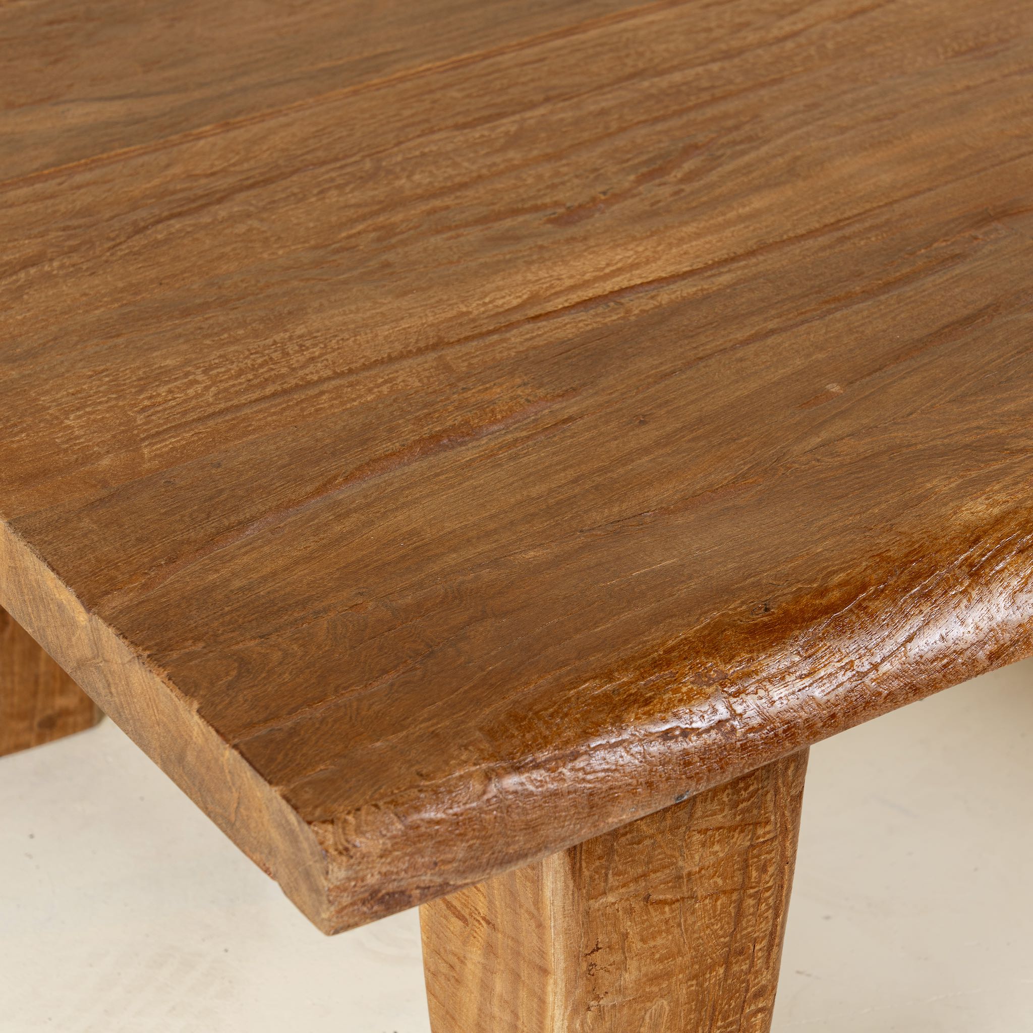 Close up picture of a rectangular rustic Indian coffee table crafted from solid reclaimed wood, a timeless example of unique wooden furniture.