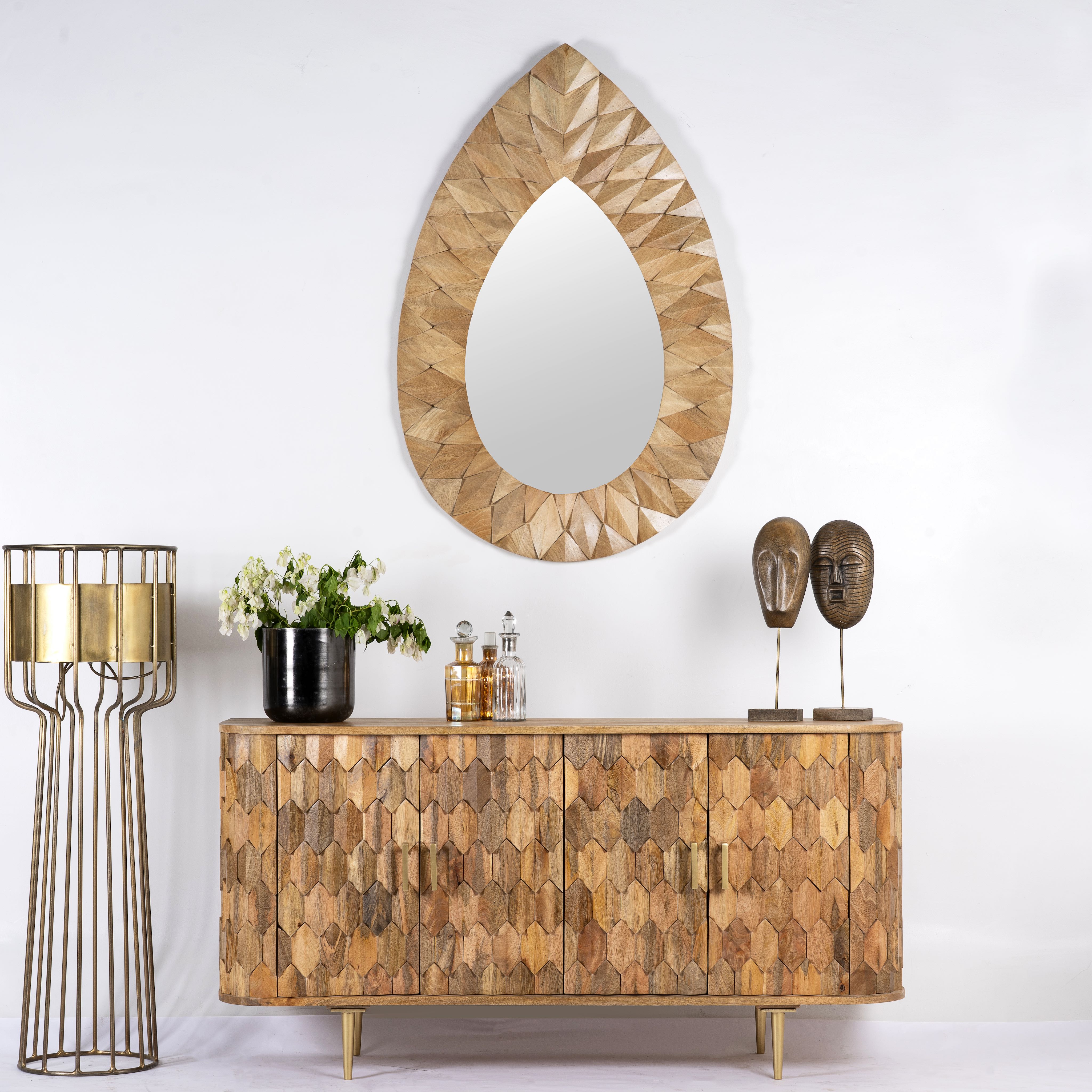 Handcrafted mango wood sideboard with hexagonal inlay design and brass-finished legs—artisanal bedroom furniture combining craftsmanship and modern elegance.