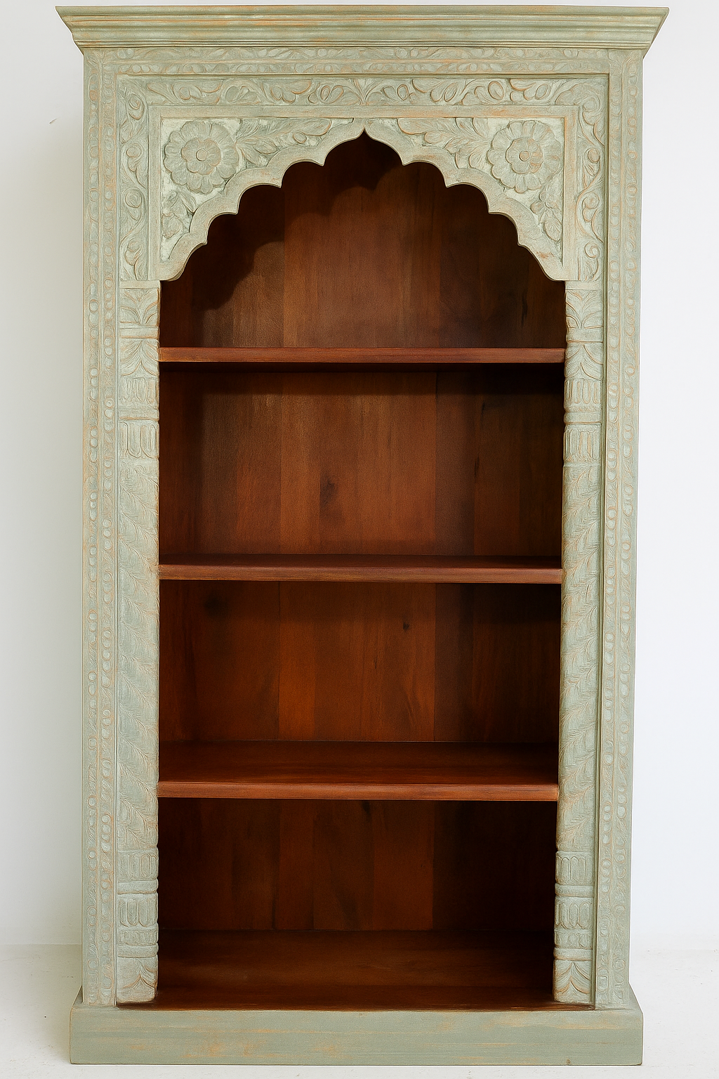 White background image of a hand-carved mango wood bookcase with Mediterranean design and open shelving – mango wood shelving and hand carved wooden furniture with natural finish.
