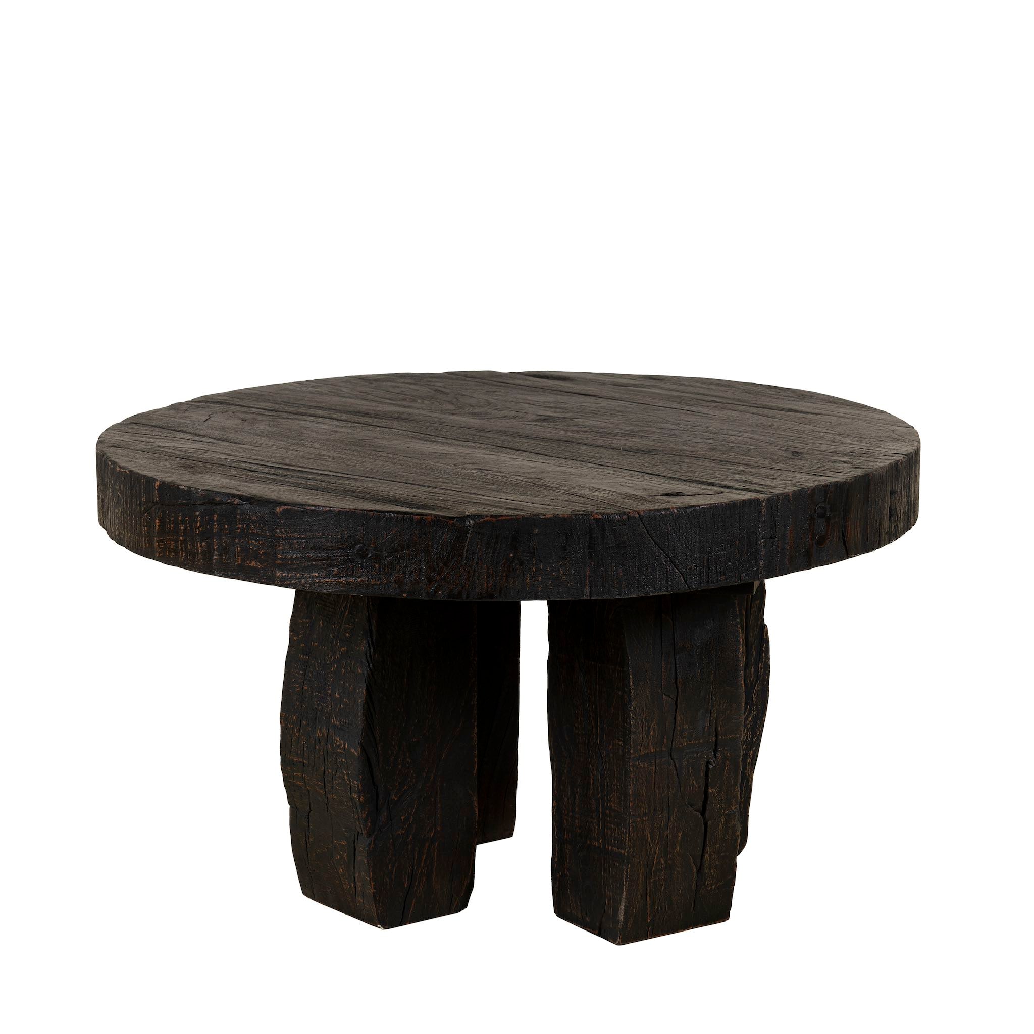 White background picture of a rustic minimalistic style black coffee table made of reclaimed wood in a living room scene.