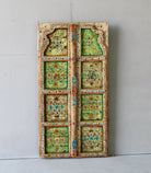 Hand-painted old Indian teak door with floral motifs in vintage style.